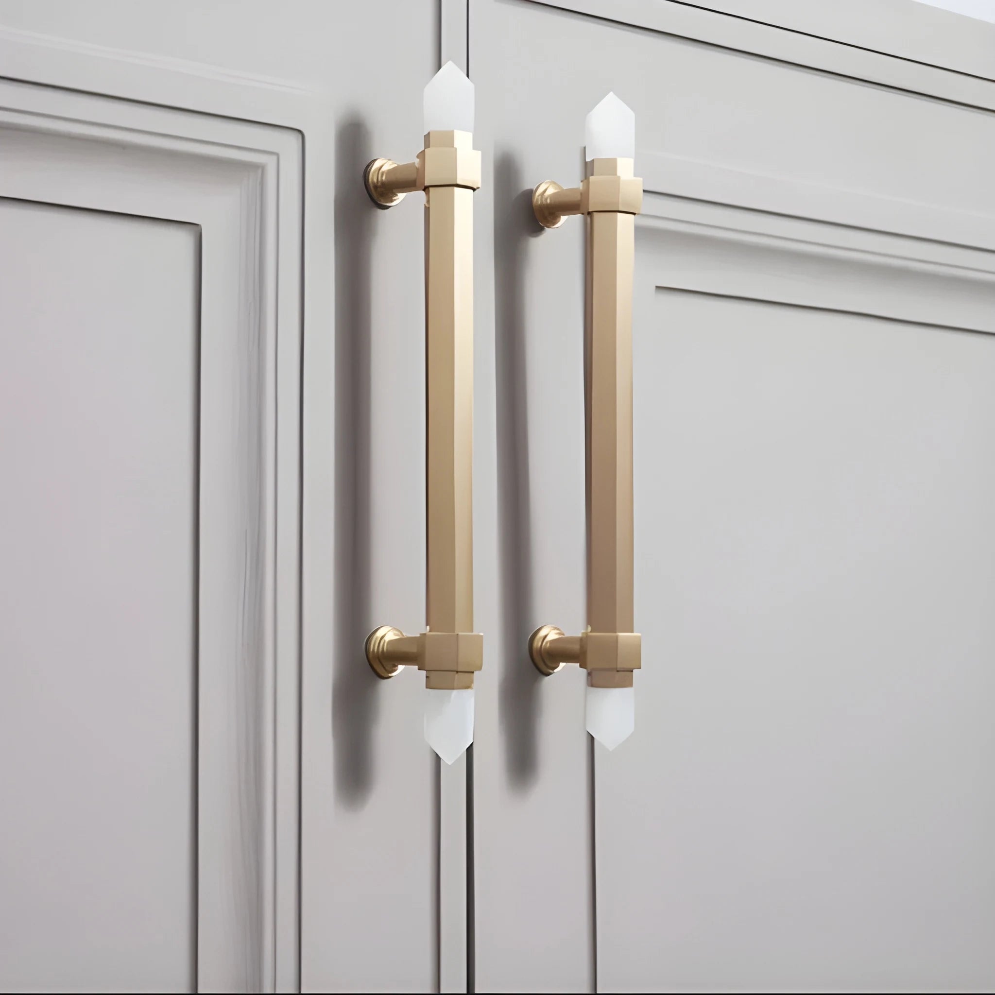 The Mantara C-0015 Quartz Handle is a modern brass and crystal handle in white, ideal for doors, wardrobes, and cabinets.