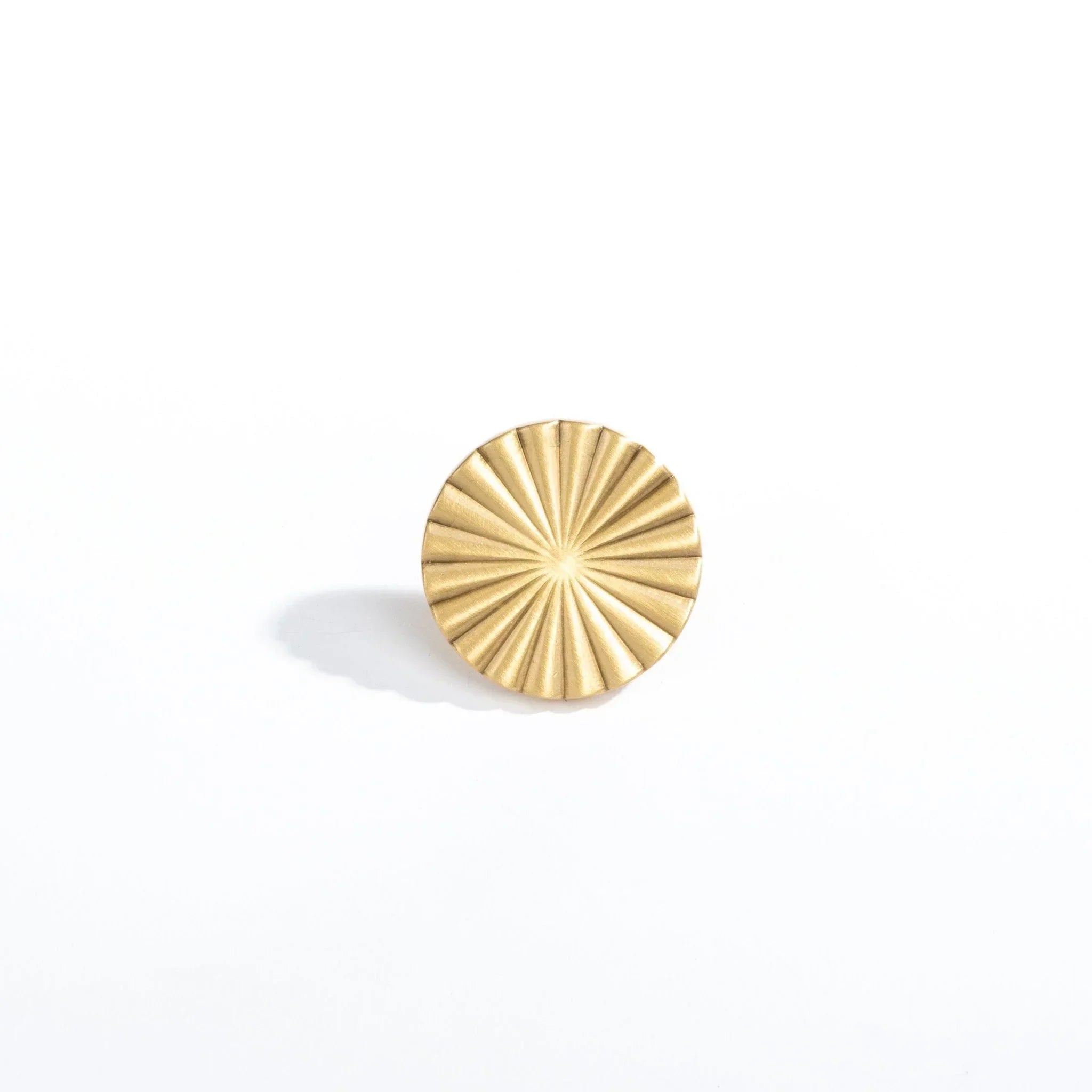 The Mantara B-0028 Rasya Knob is a modern gold brass knob with brushed finish, ideal for doors, drawers, cabinets, and wardrobes.