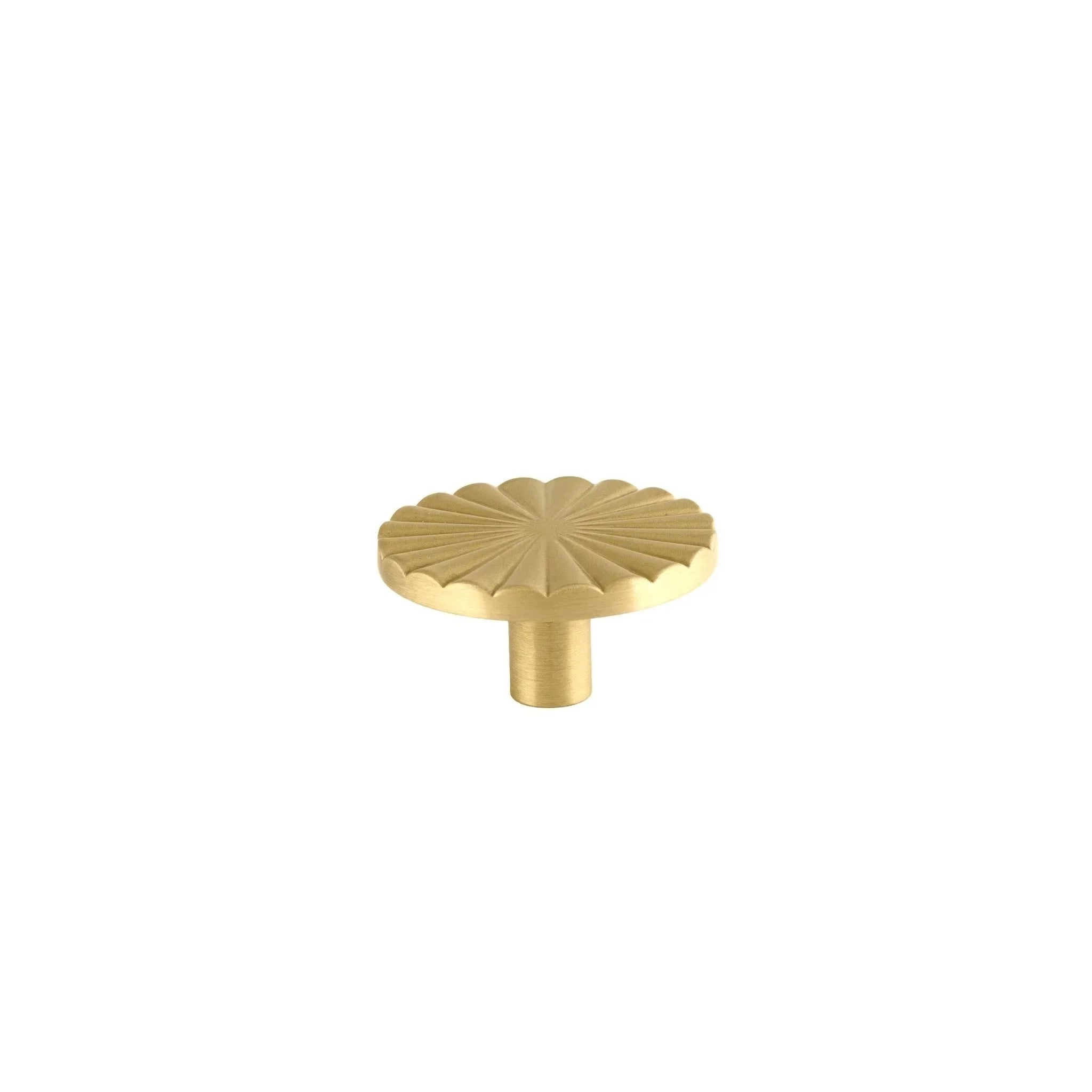 The Mantara B-0028 Rasya Knob is a modern gold brass knob with brushed finish, ideal for doors, drawers, cabinets, and wardrobes.