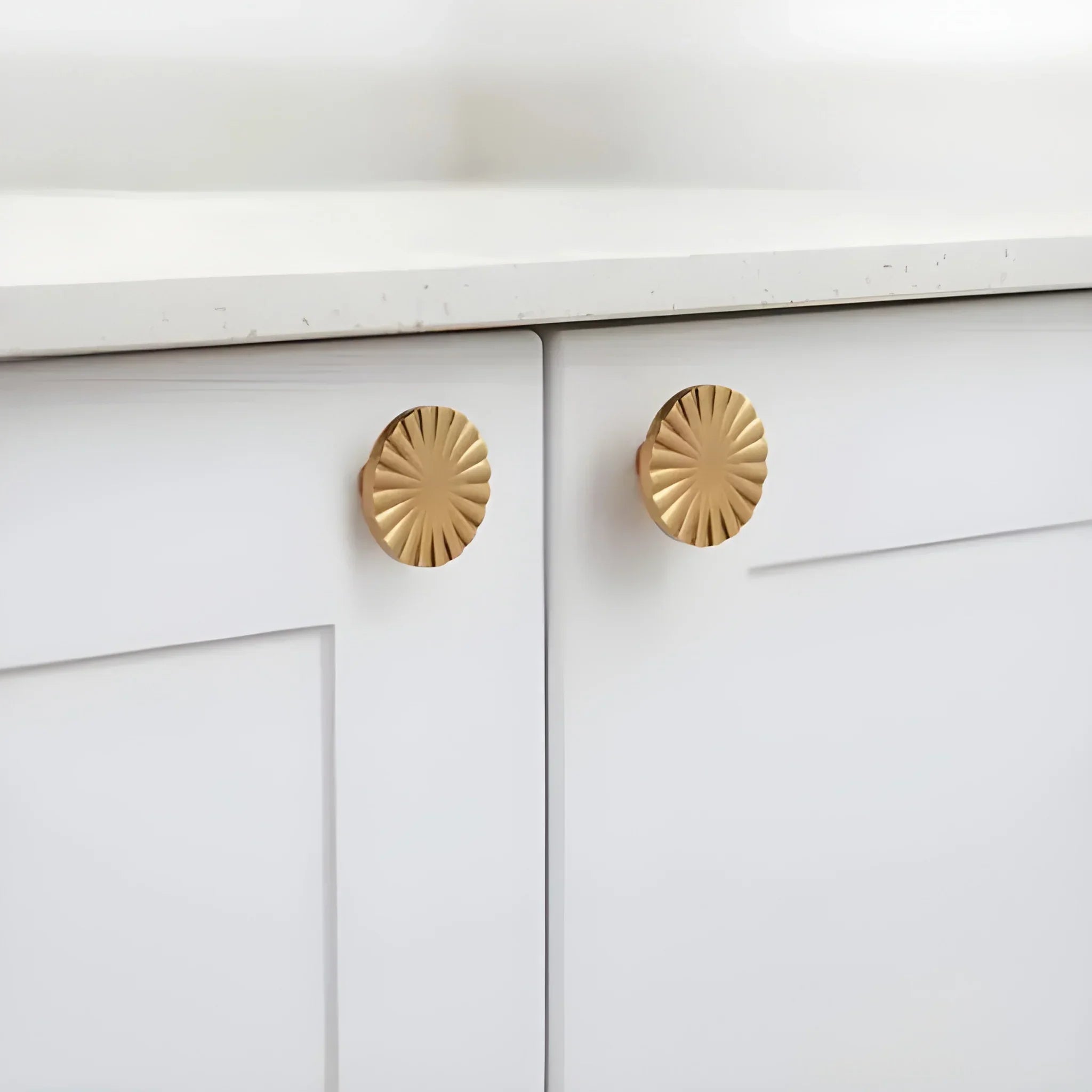 The Mantara B-0028 Rasya Knob is a modern gold brass knob with brushed finish, ideal for doors, drawers, cabinets, and wardrobes