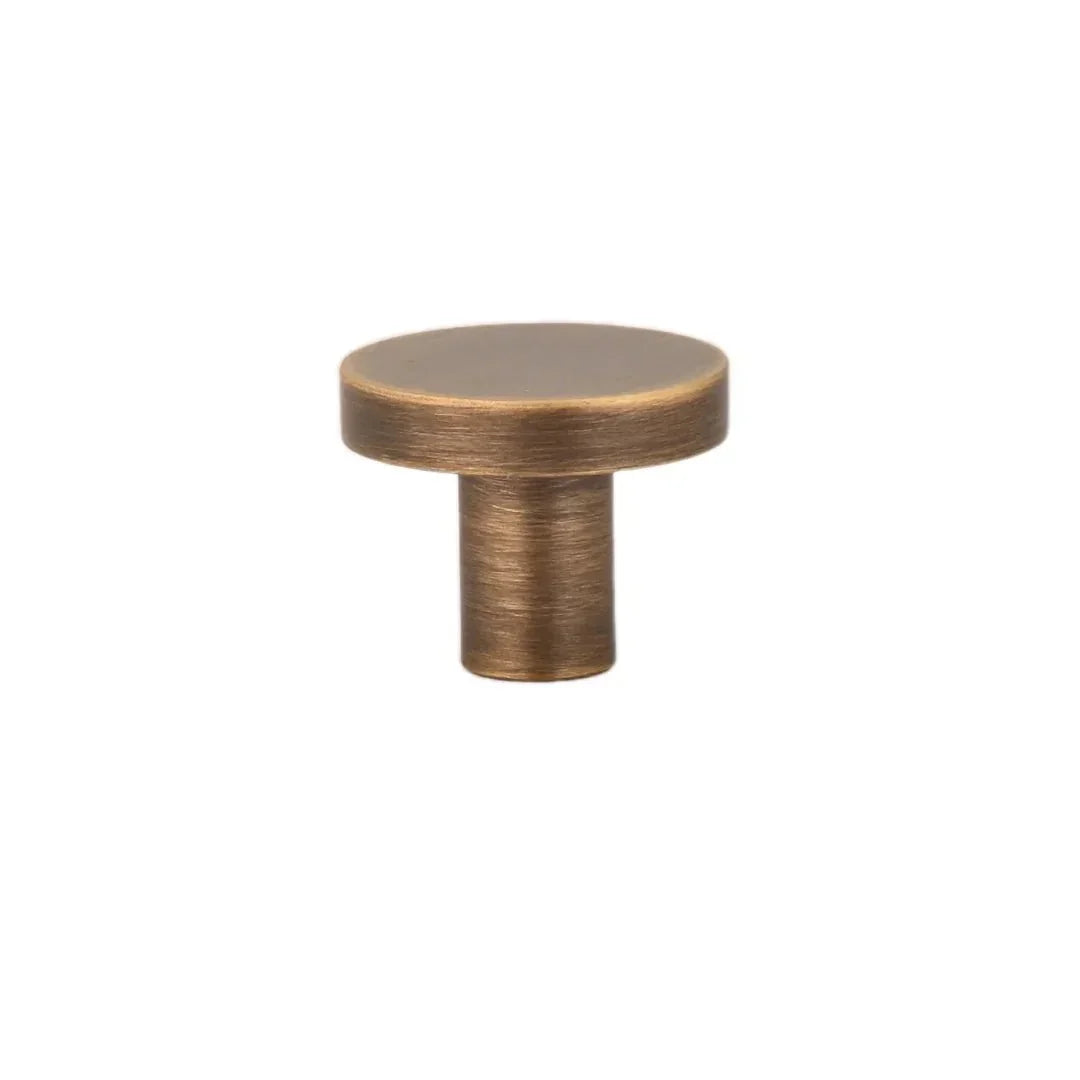 The Mantara B-0004 Regal Gold Knob is a modern solid brass knob in bronze, ideal for cabinets and wardrobes.
