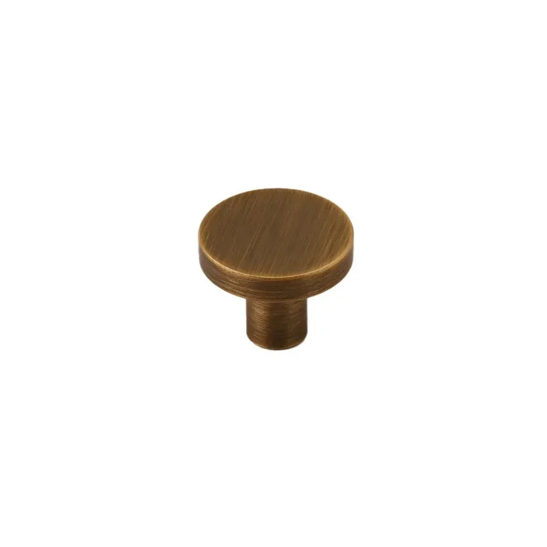 The Mantara B-0004 Regal Gold Knob is a modern solid brass knob in bronze, ideal for cabinets and wardrobes.
