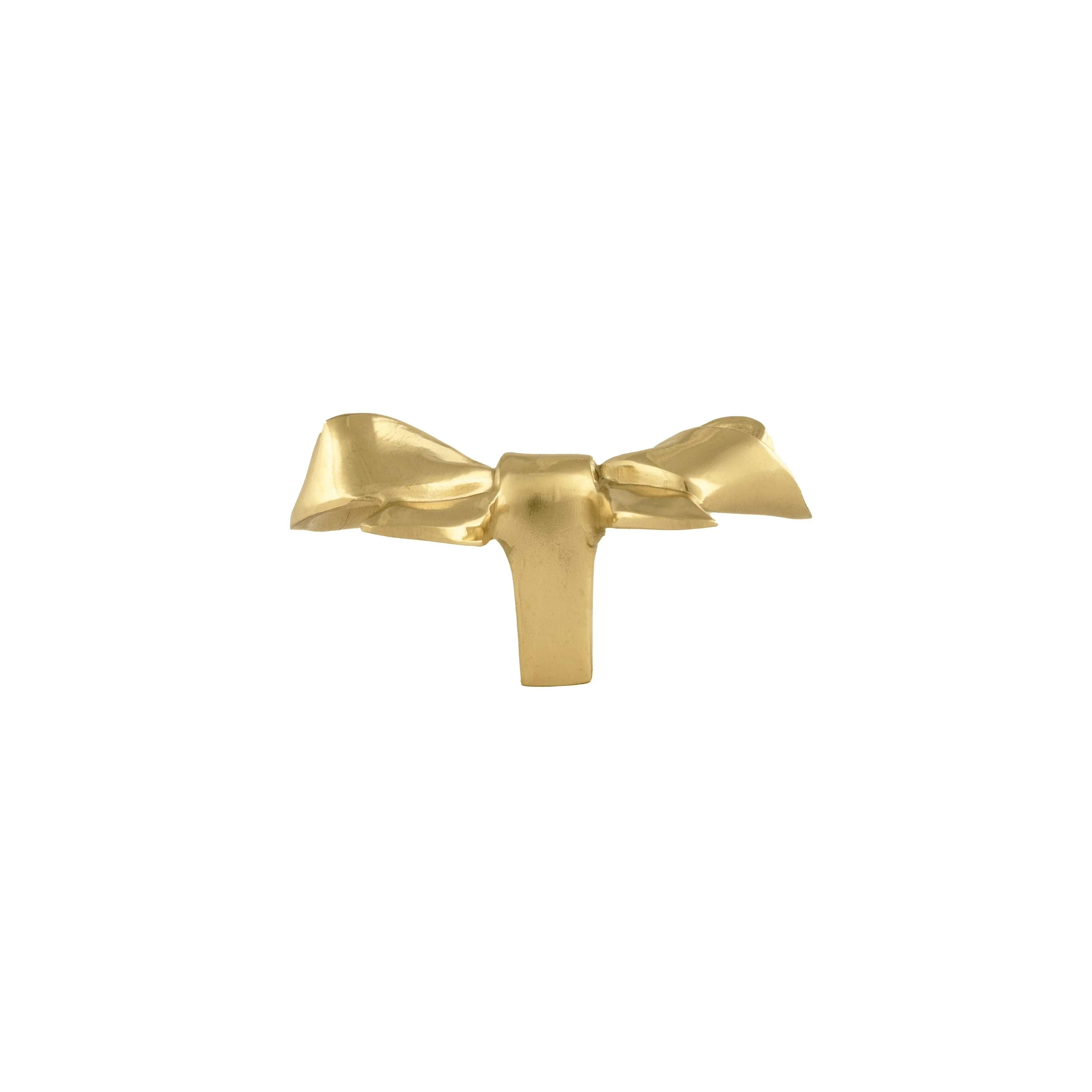 The Mantara B-0020 Ribbon Knob is a modern polished brass knob in gold, perfect for wardrobes, kitchens, drawers, and cabinets.
