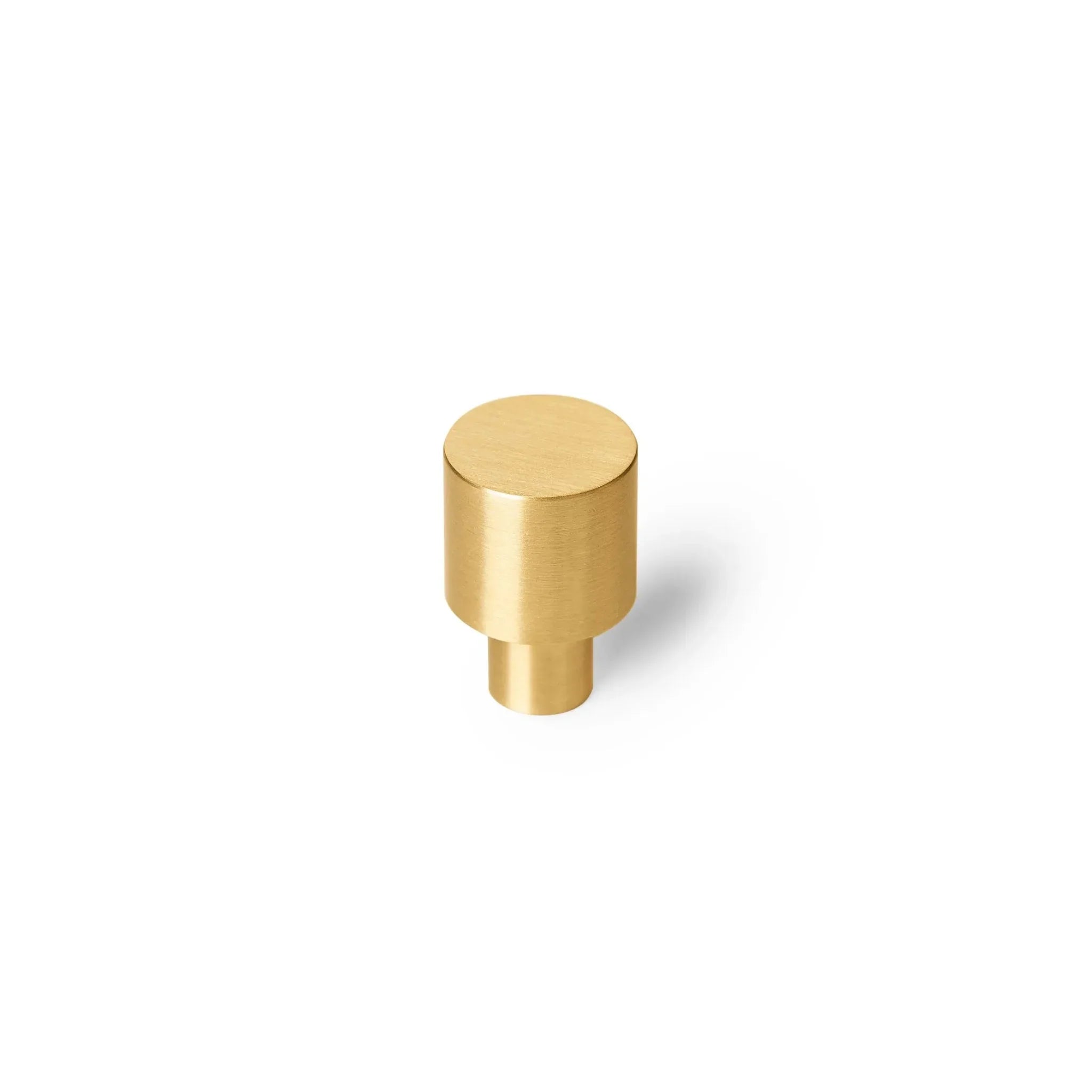 The Mantara B-0003 Salden Knob is a modern brass knob in gold with a brushed finish, ideal for wardrobes, drawers, and cabinets.