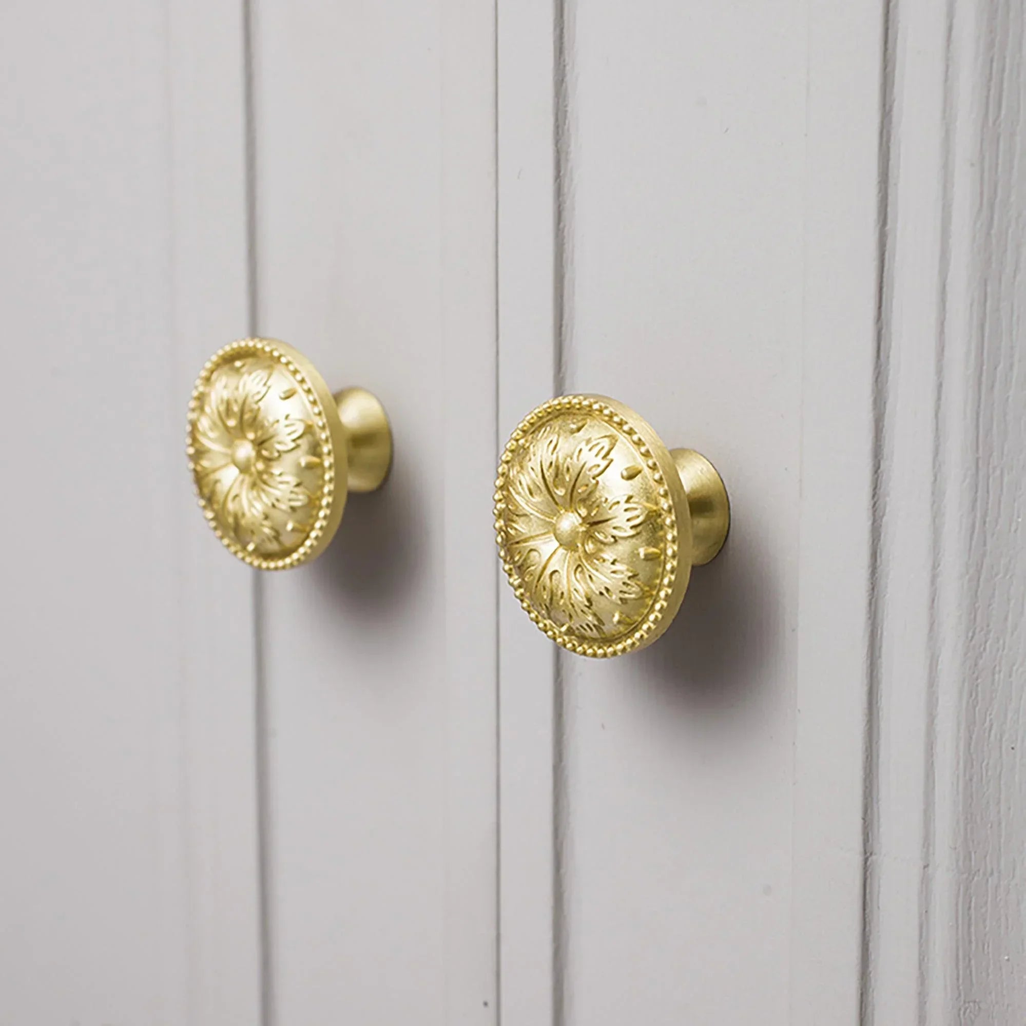 The Mantara B-0012 Sovereign Knob is a modern brass knob in gold with a brushed finish, ideal for doors, wardrobes, and cabinets.