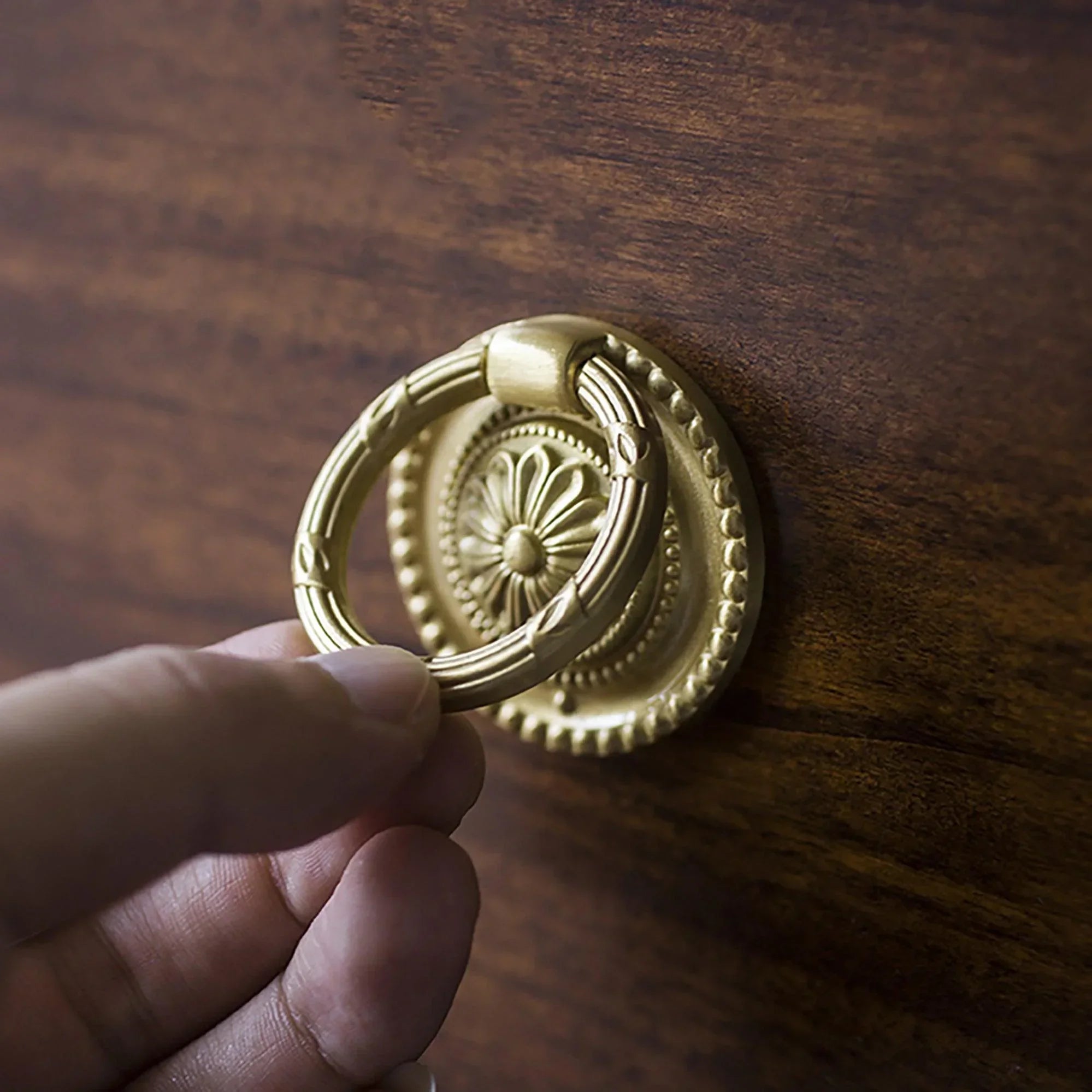 The Mantara B-0013 Sovereign Ring Knob is a modern polished brass knob in gold, perfect for wardrobes, doors, and cabinets.