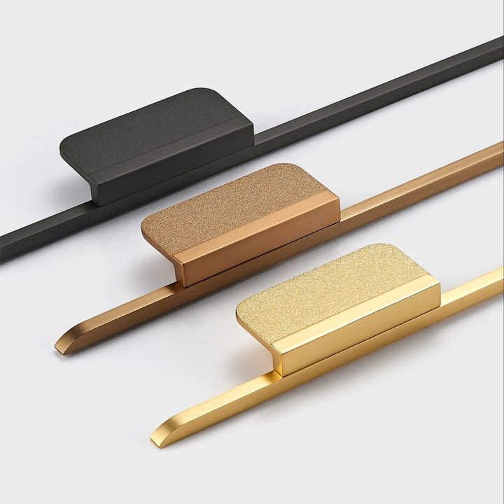 Three zinc cabinet handles in black, rose gold, and gold finishes, displayed on a white background—by Mantara.