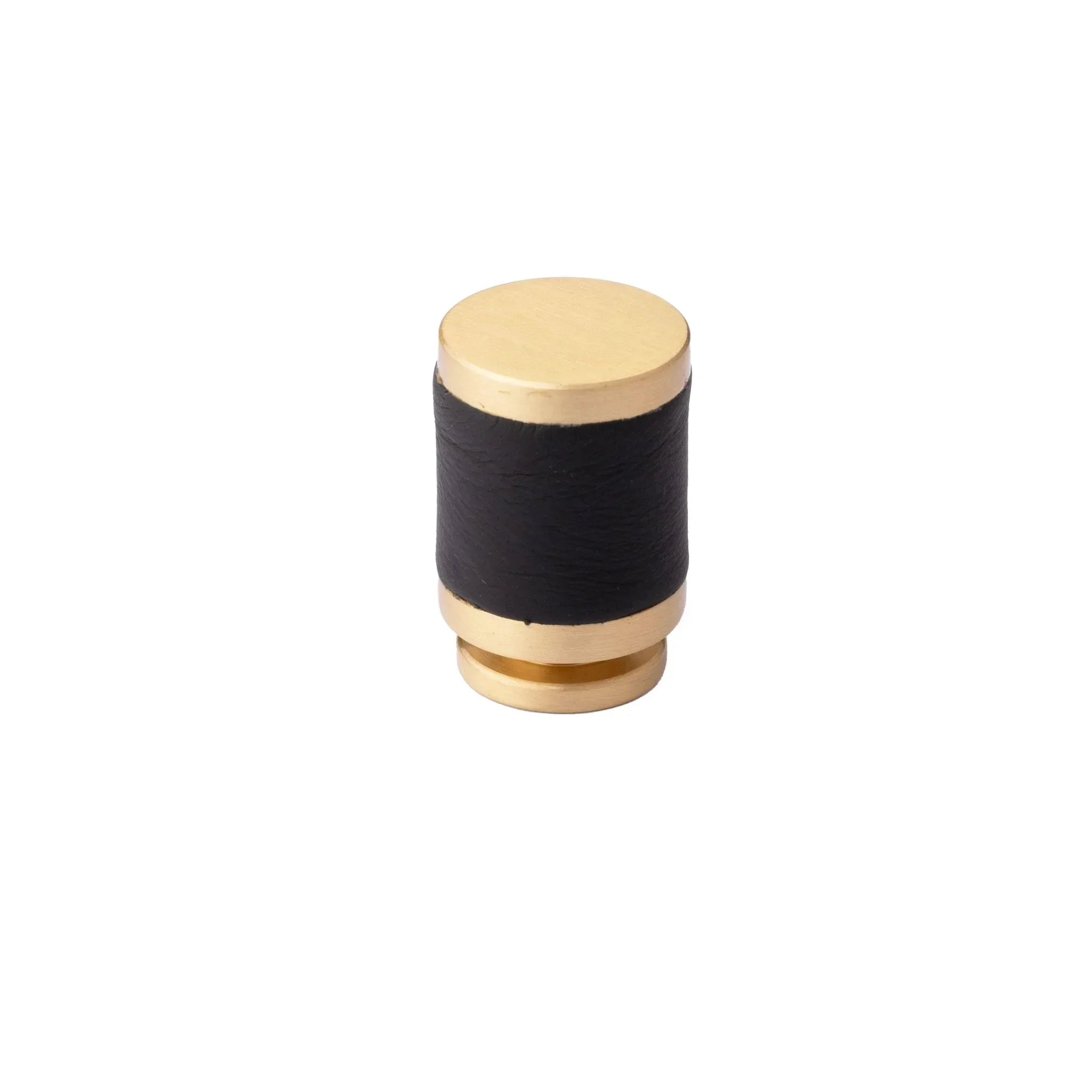The Mantara L-0003 Tanner Knob is a modern brass and leather knob in black, perfect for cabinets and furniture.
