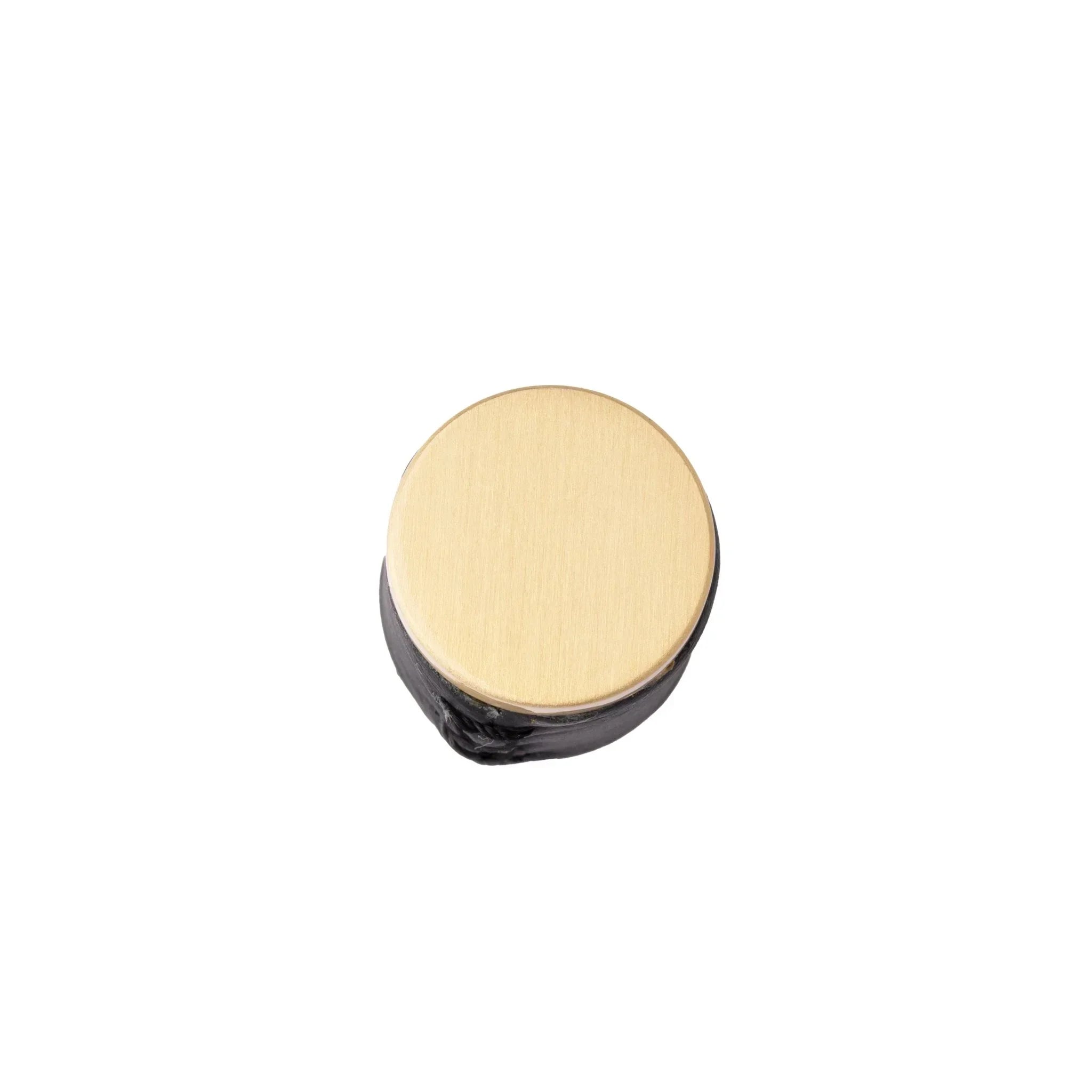 The Mantara L-0003 Tanner Knob is a modern brass and leather knob in black, perfect for cabinets and furniture.