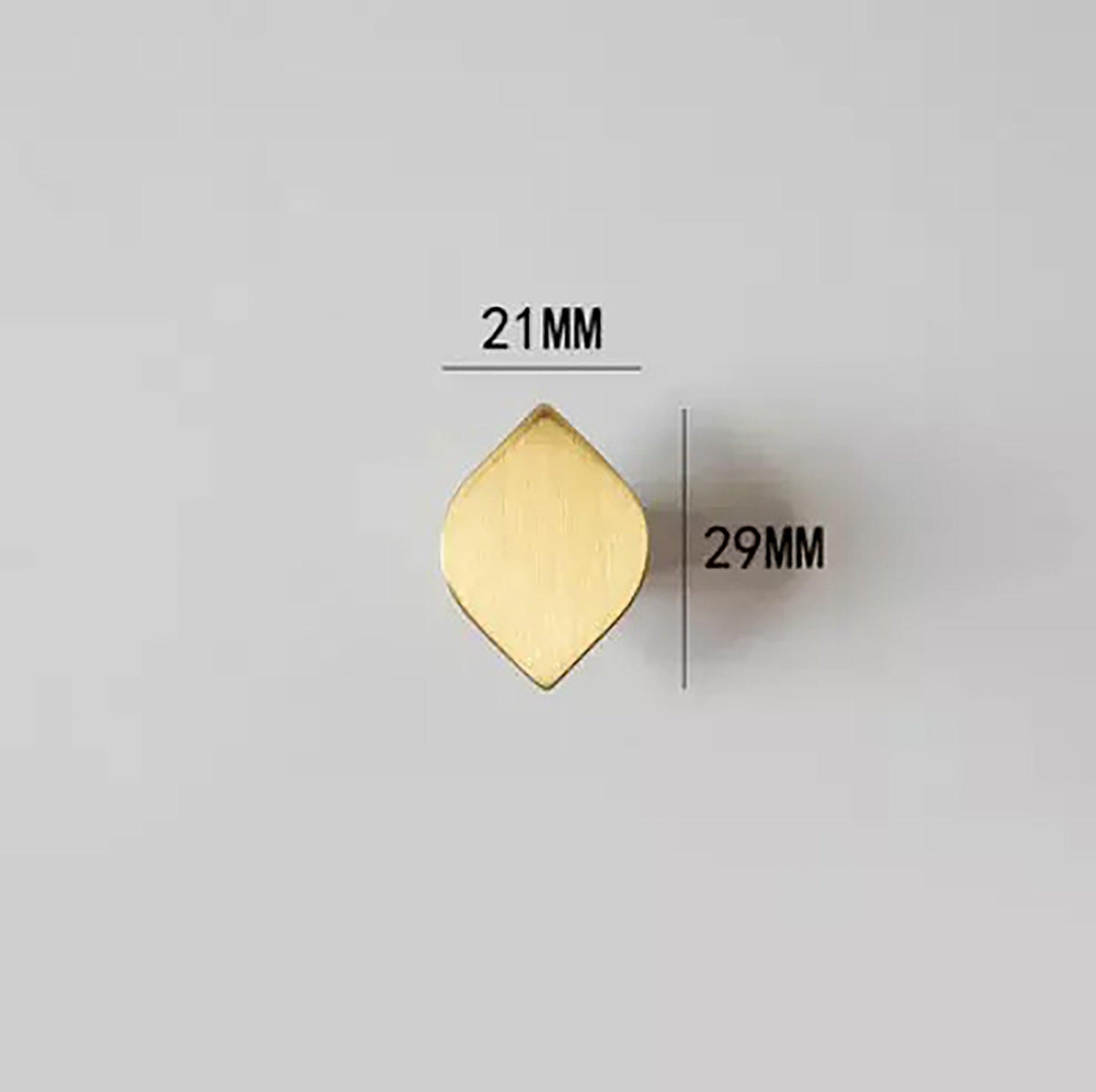 The Tarang Knob by Mantara (B-0104) is a brushed brass modern pair knob in gold, perfect for wardrobes, doors, and kitchens.
