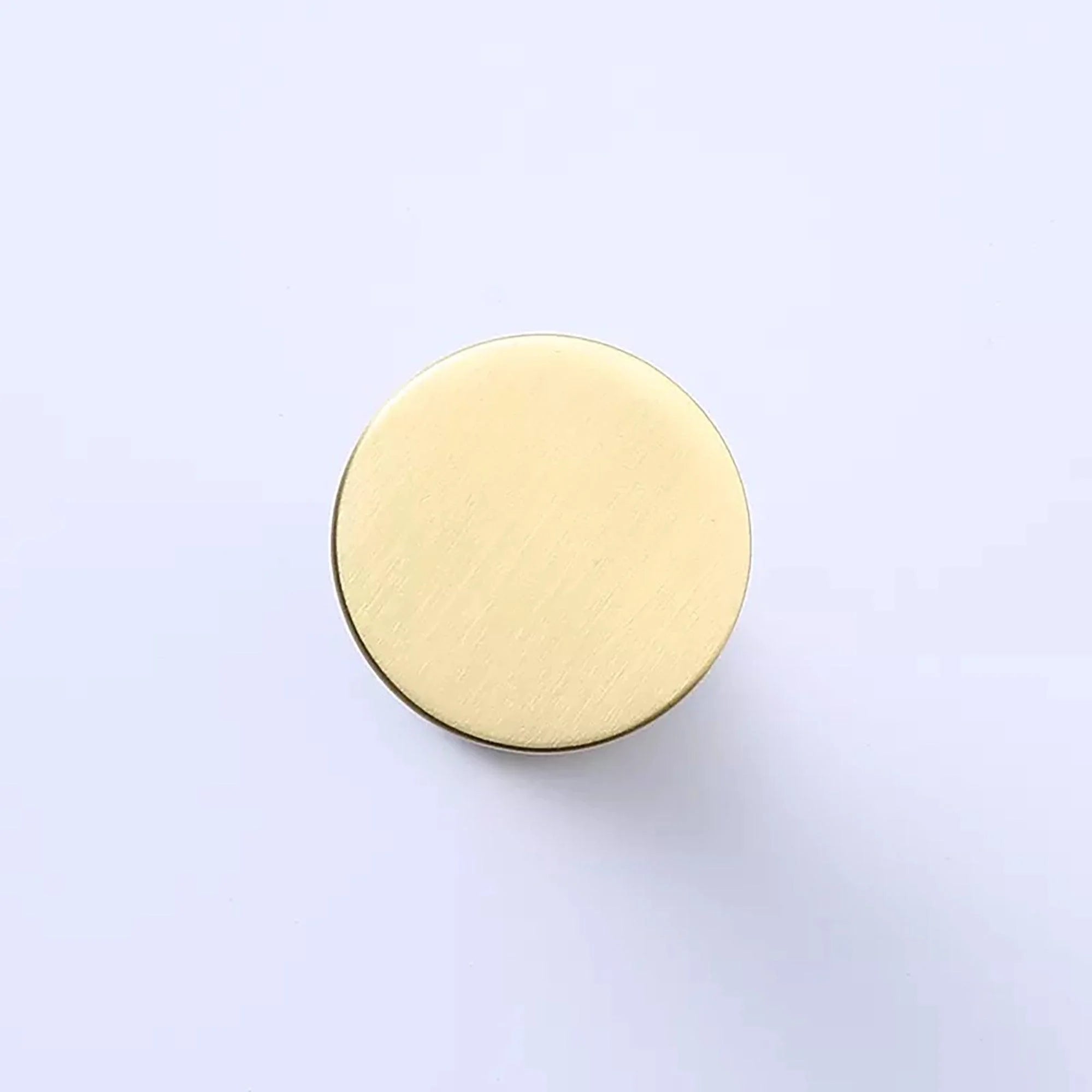 Mantara Tatiana Hook B-0097 is a modern brushed brass wall hook in gold, ideal for bathrooms, bedrooms, and living spaces.