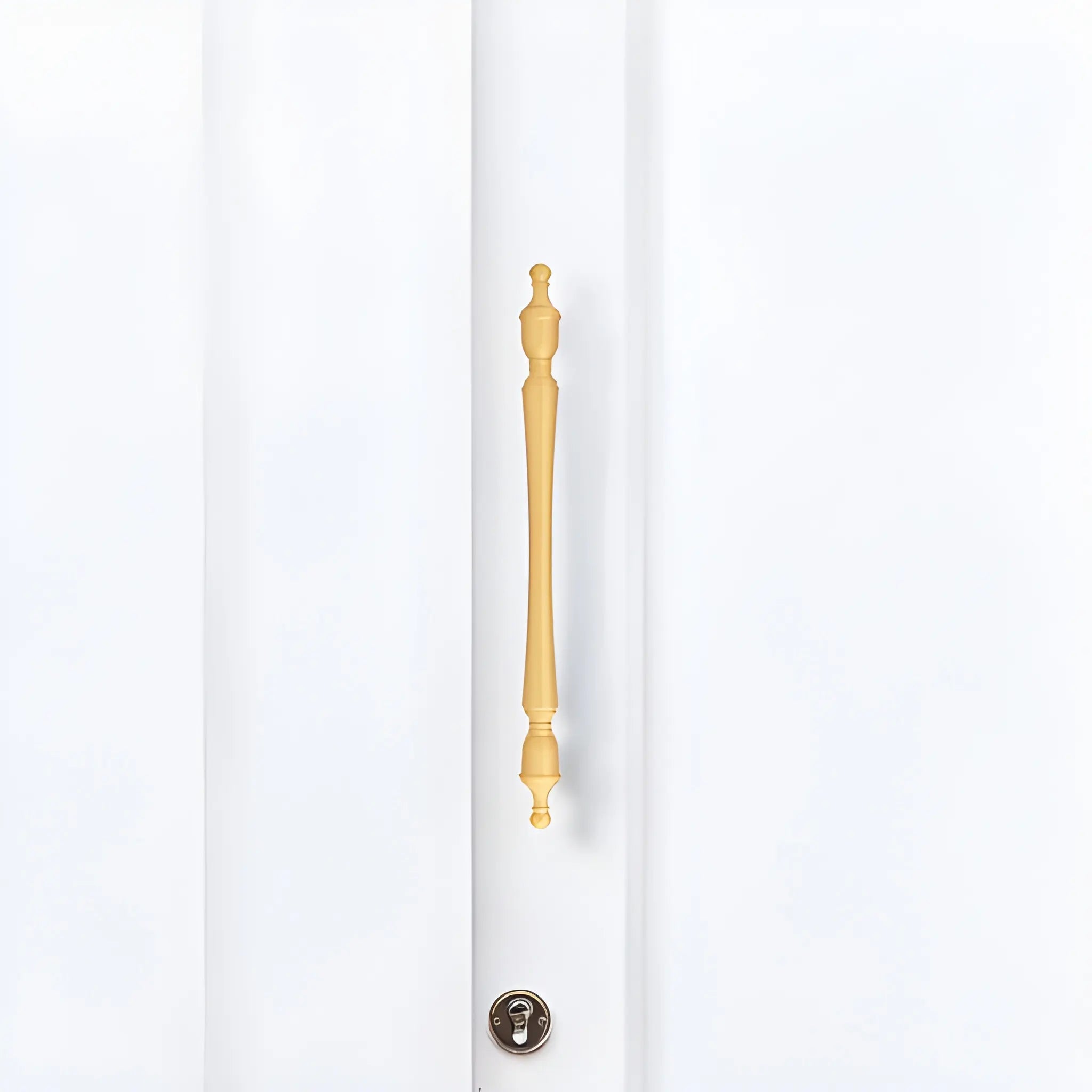 The Mantara B-0129 Thara Handle is a modern brass handle in bronze and gold, ideal for drawers, cabinets, and kitchen furniture.