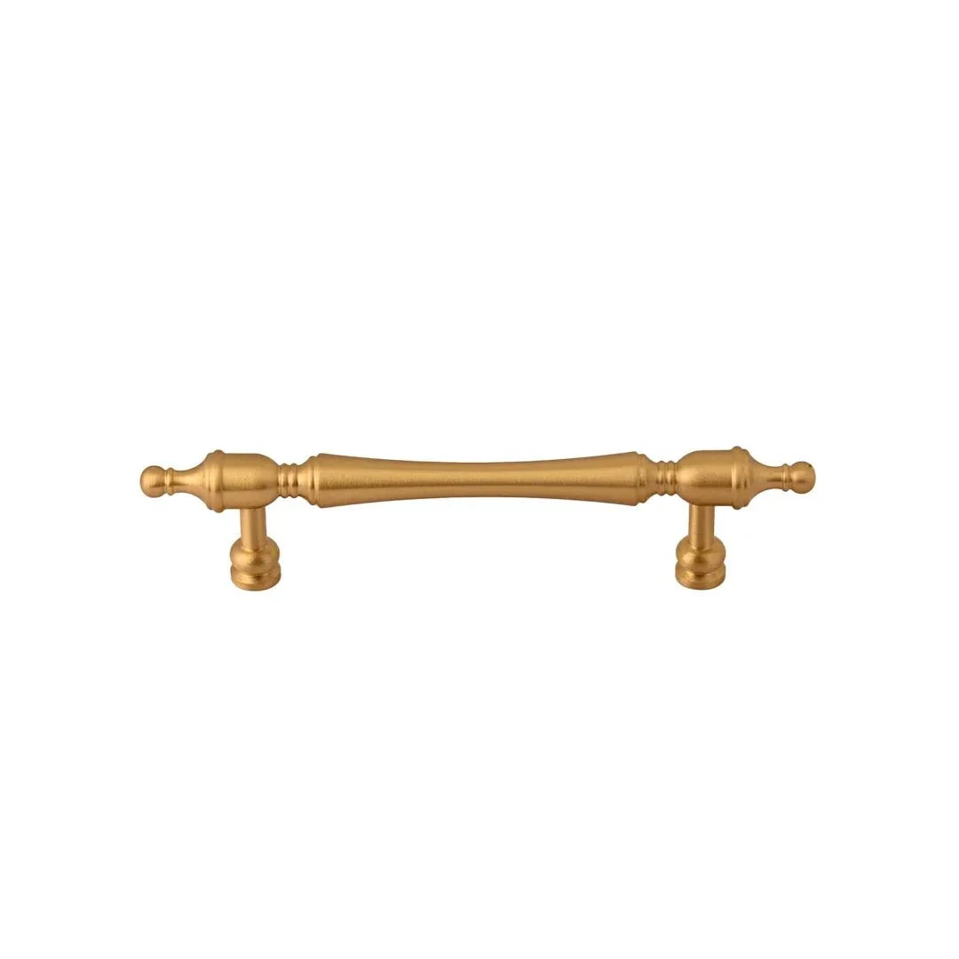The Mantara B-0129 Thara Handle is a modern brass handle in bronze and gold, ideal for drawers, cabinets, and kitchen furniture.