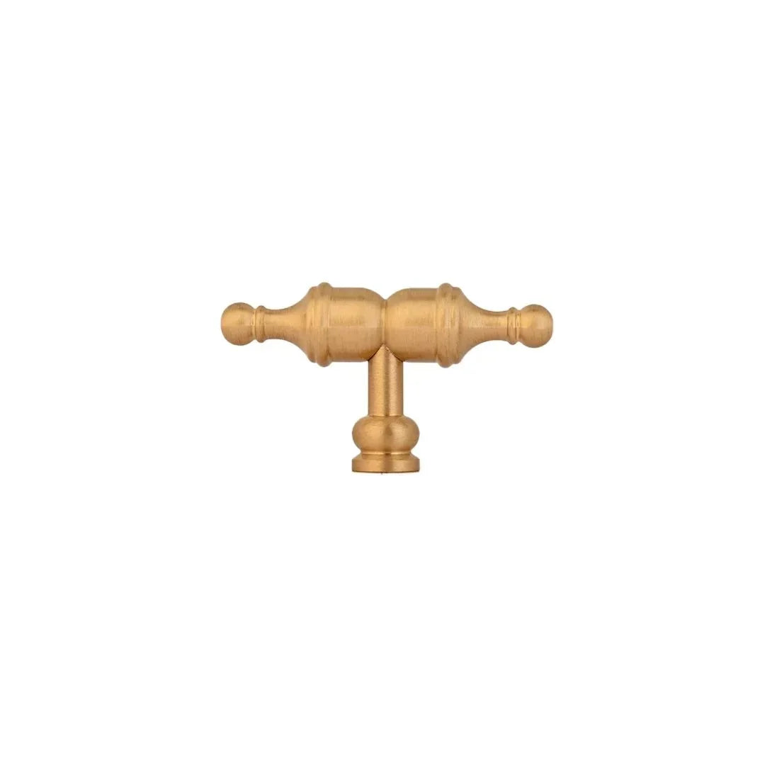 The Mantara B-0129 Thara Handle is a modern brass handle in bronze and gold, ideal for drawers, cabinets, and kitchen furniture.