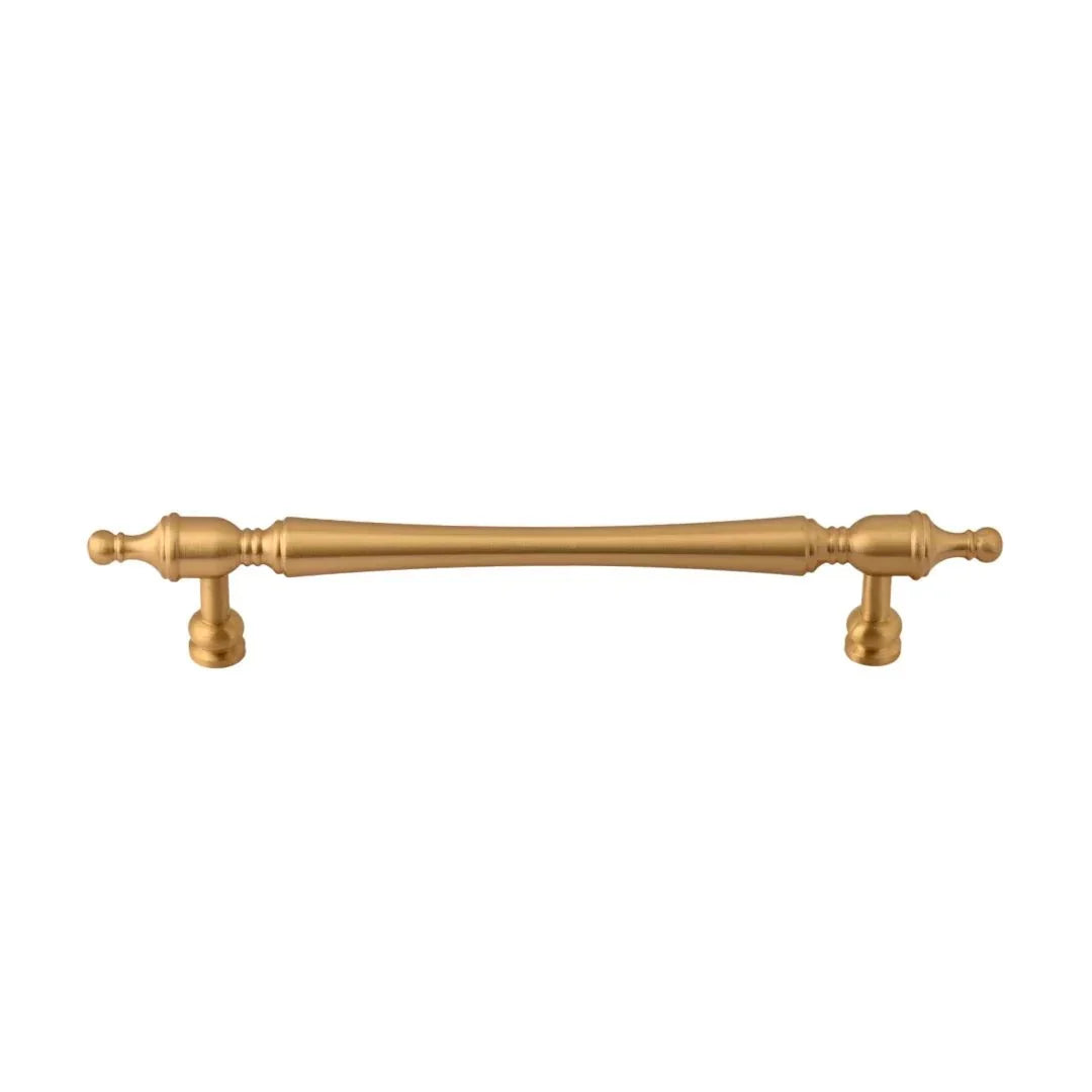 The Mantara B-0129 Thara Handle is a modern brass handle in bronze and gold, ideal for drawers, cabinets, and kitchen furniture.