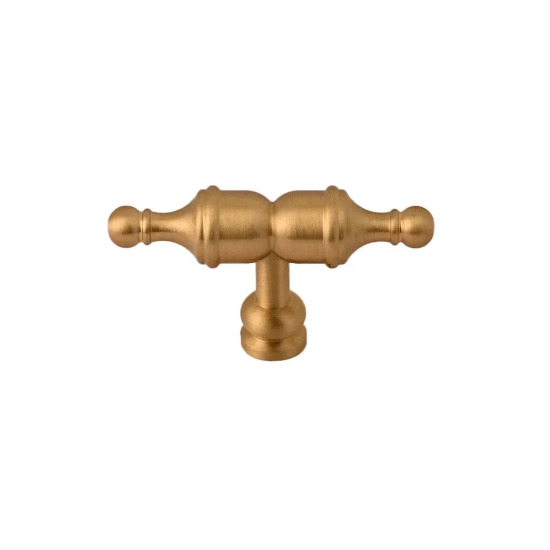 The Mantara B-0129 Thara Handle is a modern brass handle in bronze and gold, ideal for drawers, cabinets, and kitchen furniture.