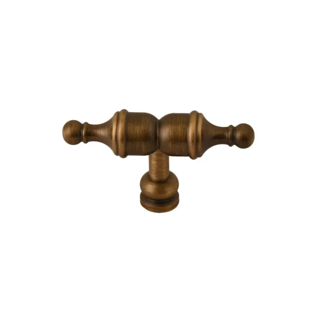 The Mantara B-0129 Thara Handle is a modern brass handle in bronze and gold, ideal for drawers, cabinets, and kitchen furniture.
