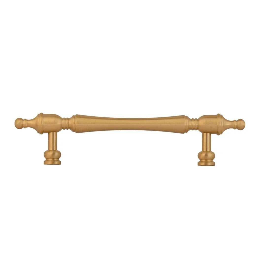 The Mantara B-0129 Thara Handle is a modern brass handle in bronze and gold, ideal for drawers, cabinets, and kitchen furniture.