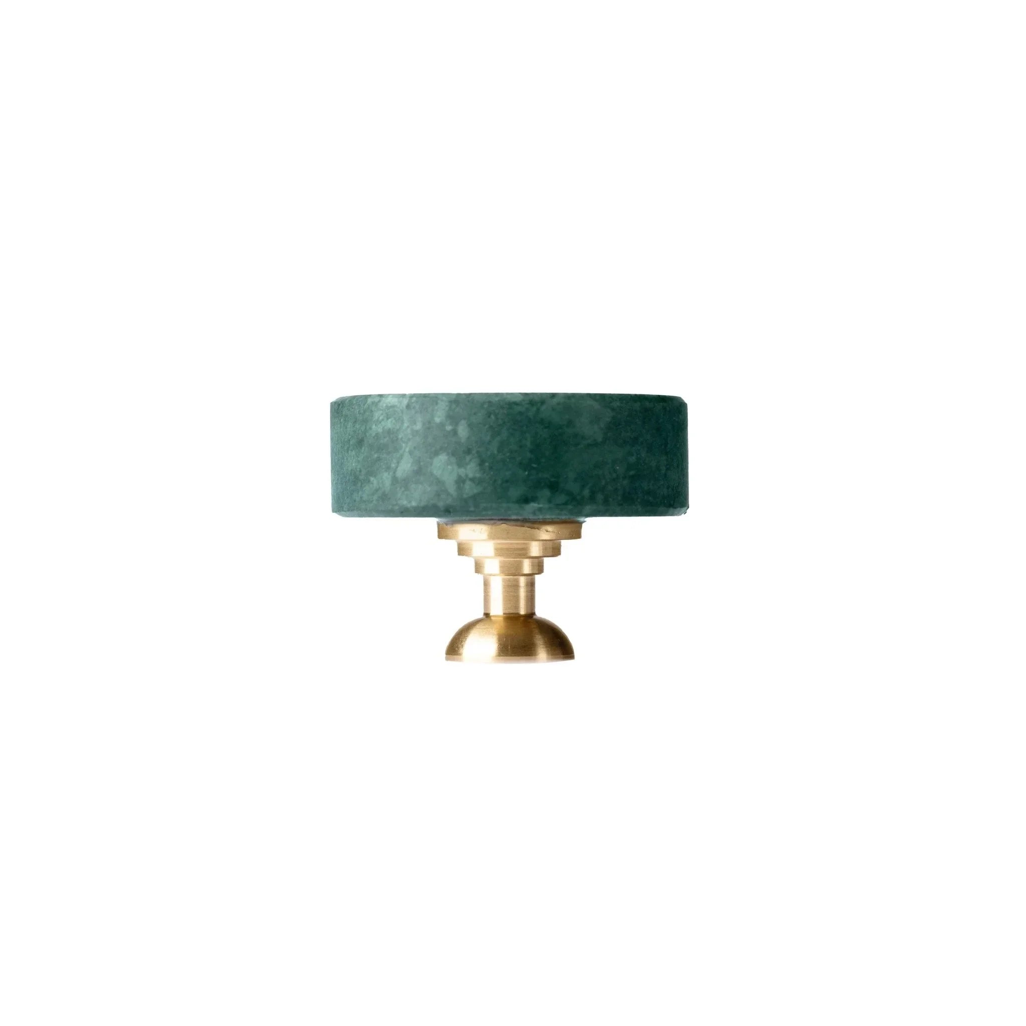 The Mantara M-0001 Theo Knob is a modern marble and brass knob in green, ideal for doors, drawers, and cabinets.