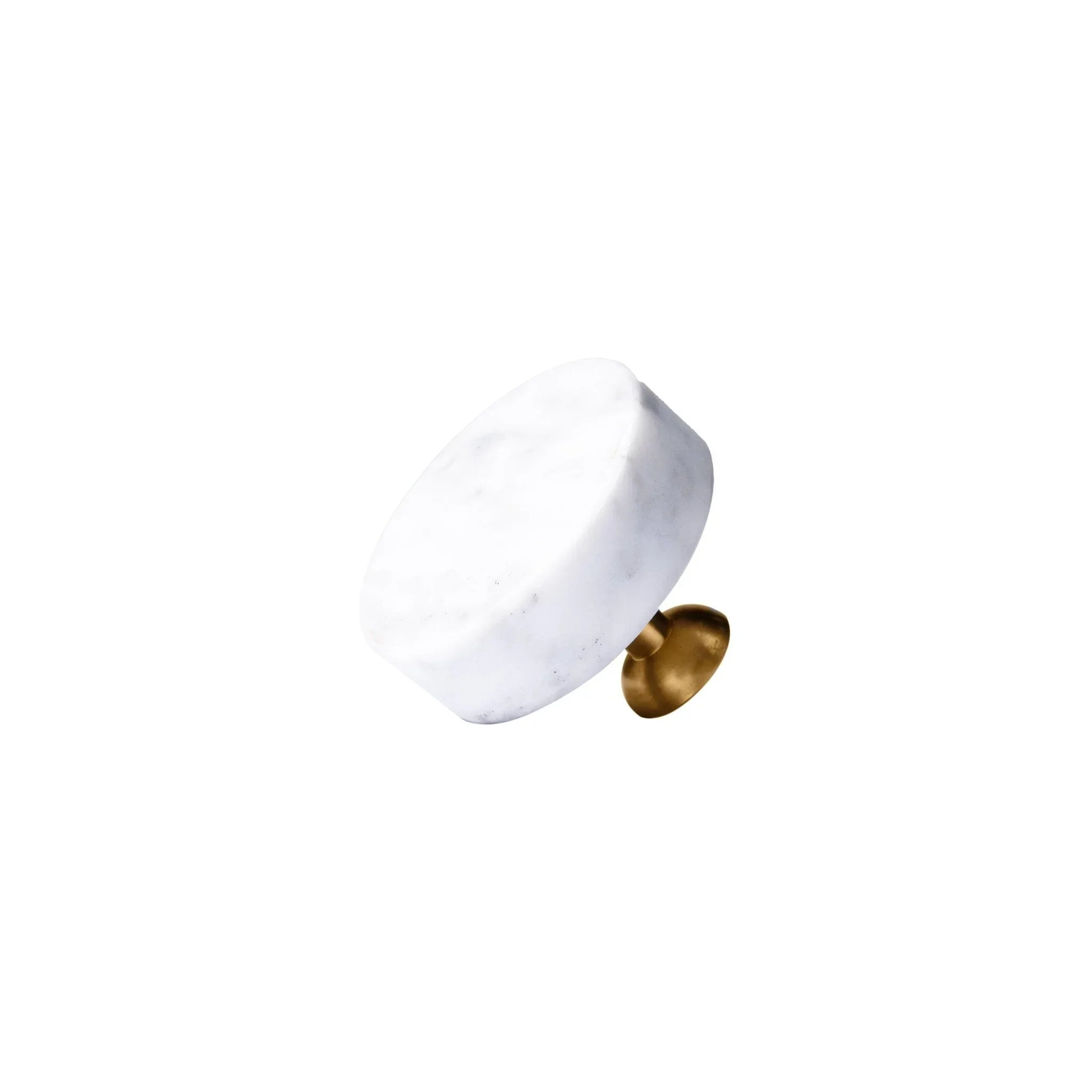 The Mantara M-0001 Theo Knob is a modern marble and brass knob in white, ideal for doors, drawers, and cabinets.