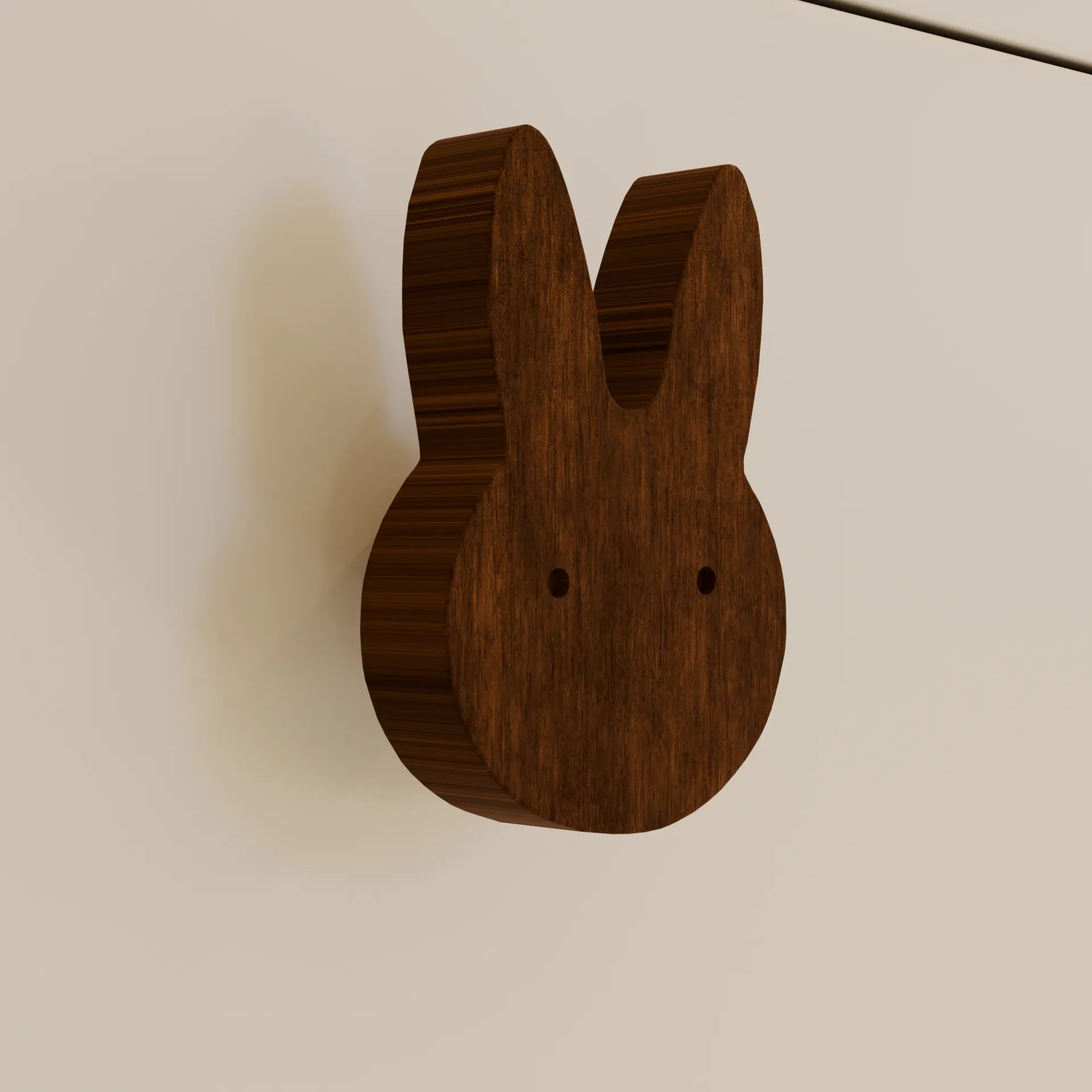 Mantara Rabbit Knob W-0024 is a modern walnut wooden knob/hook, ideal for kids’ rooms, drawers, and cabinets.