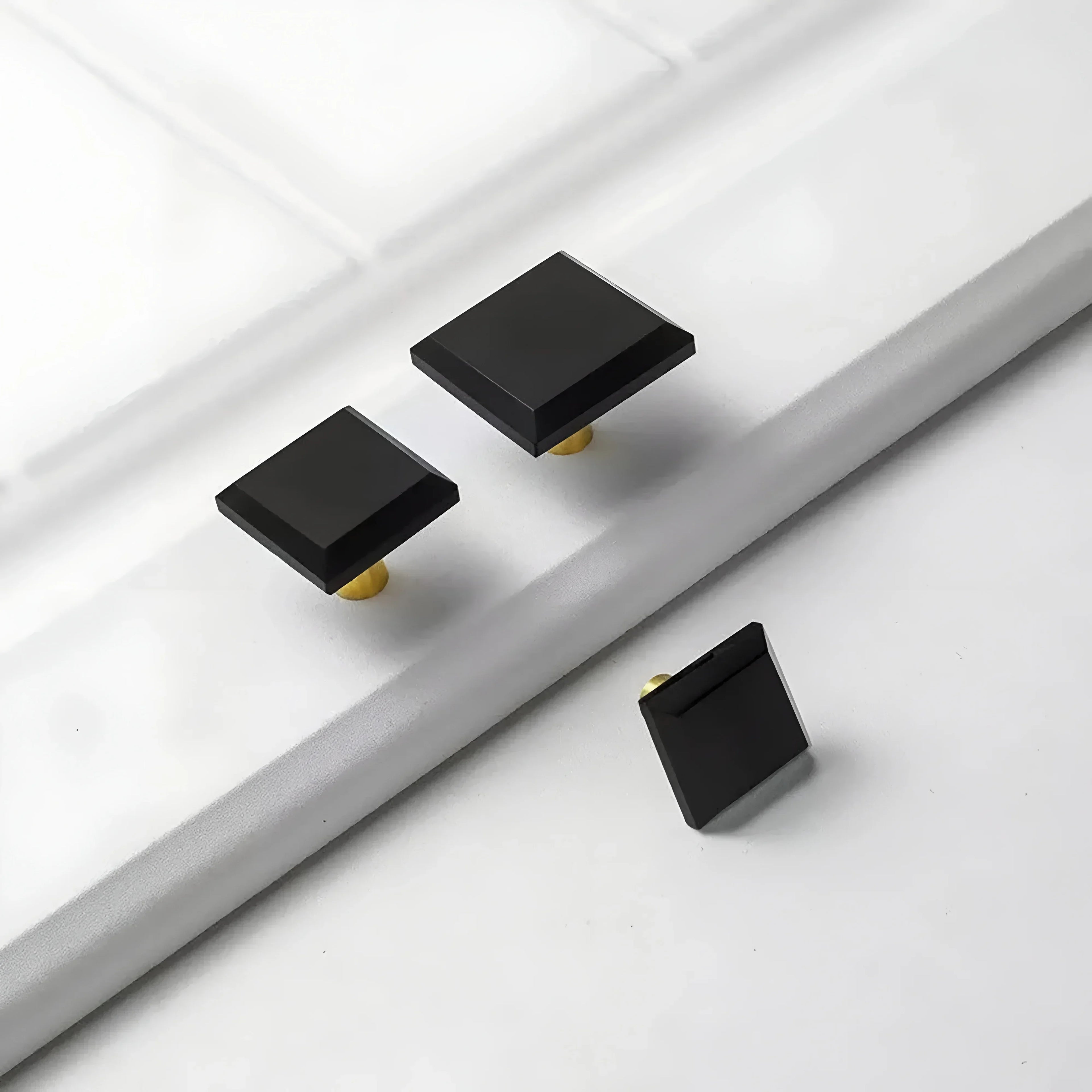 The Mantara A-0013 Void Knob is a modern black brass and acrylic knob with polished finish, perfect for doors, drawers, and cabinets.