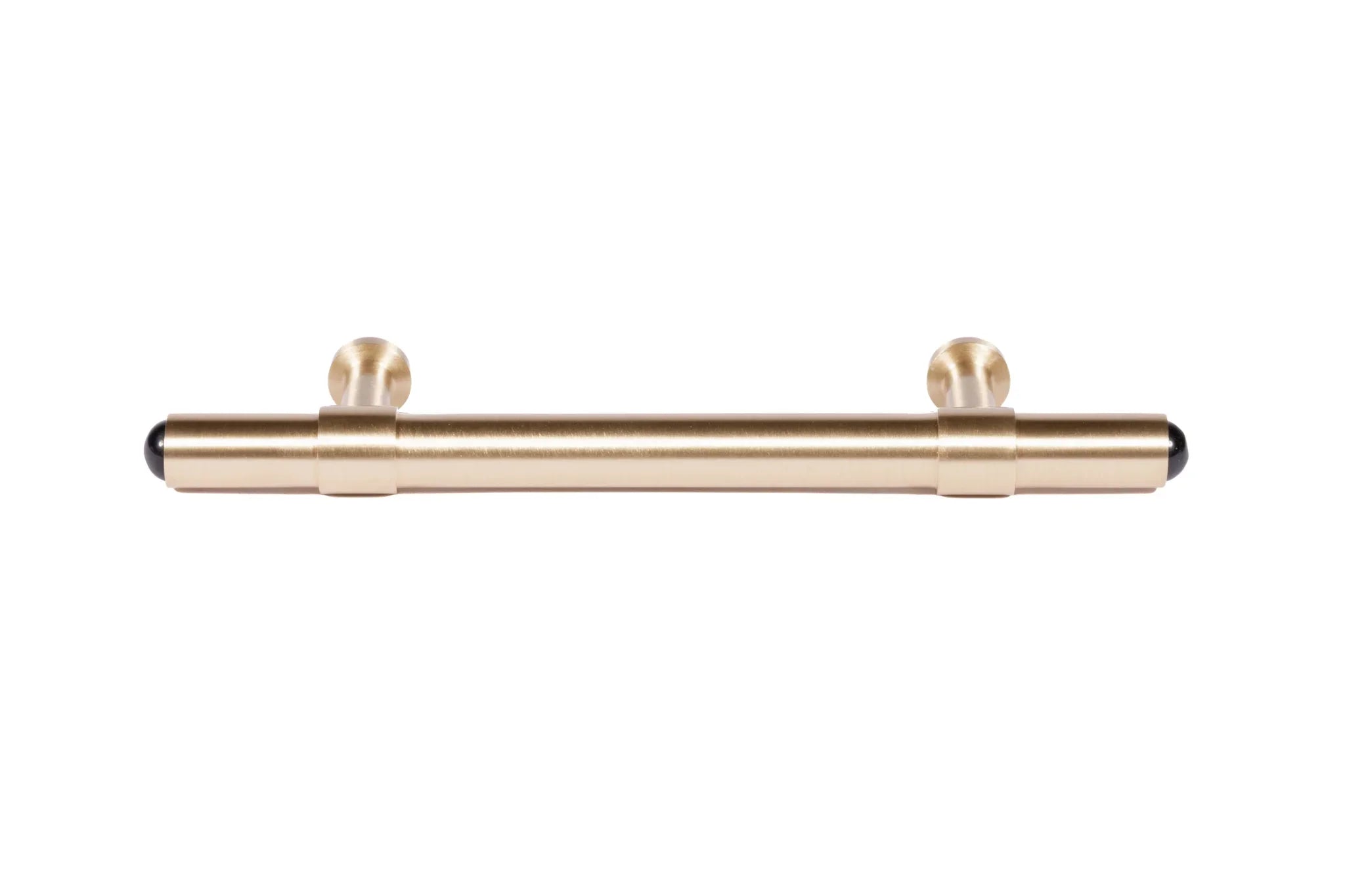 The Zania Handle by Mantara B-0111 is a modern brushed brass handle in gold, ideal for kitchens, dressers, and cabinets.