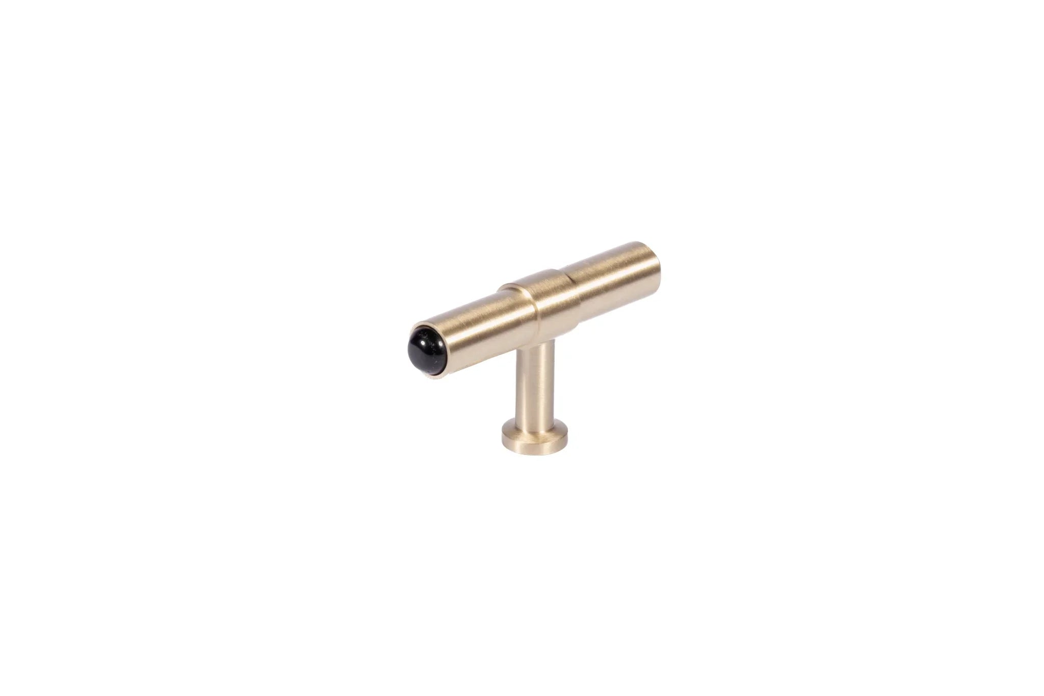 The Zania Handle by Mantara B-0111 is a modern brushed brass handle in gold, ideal for kitchens, dressers, and cabinets.