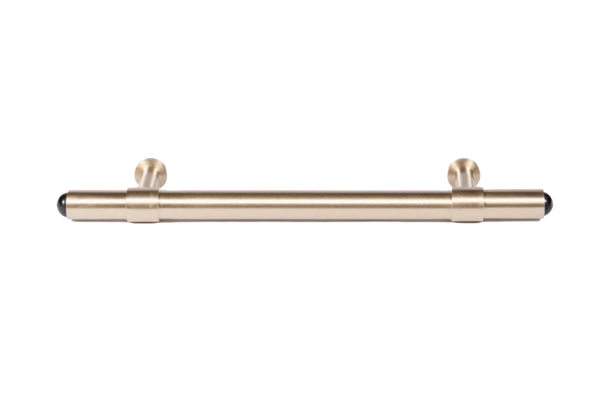 The Zania Handle by Mantara B-0111 is a modern brushed brass handle in gold, ideal for kitchens, dressers, and cabinets.