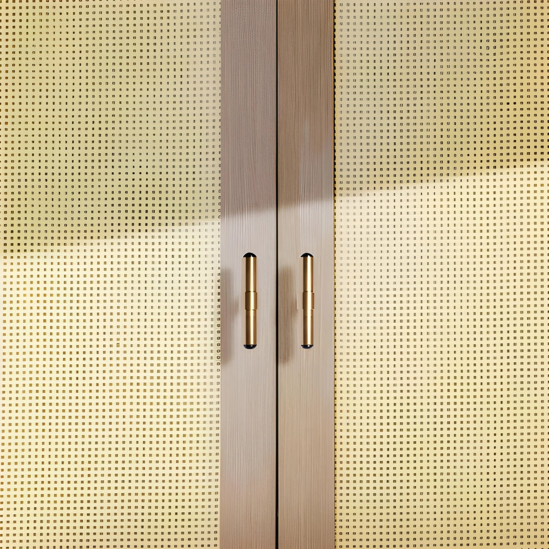 The Zania Handle by Mantara B-0111 is a modern brushed brass handle in gold, ideal for kitchens, dressers, and cabinets.