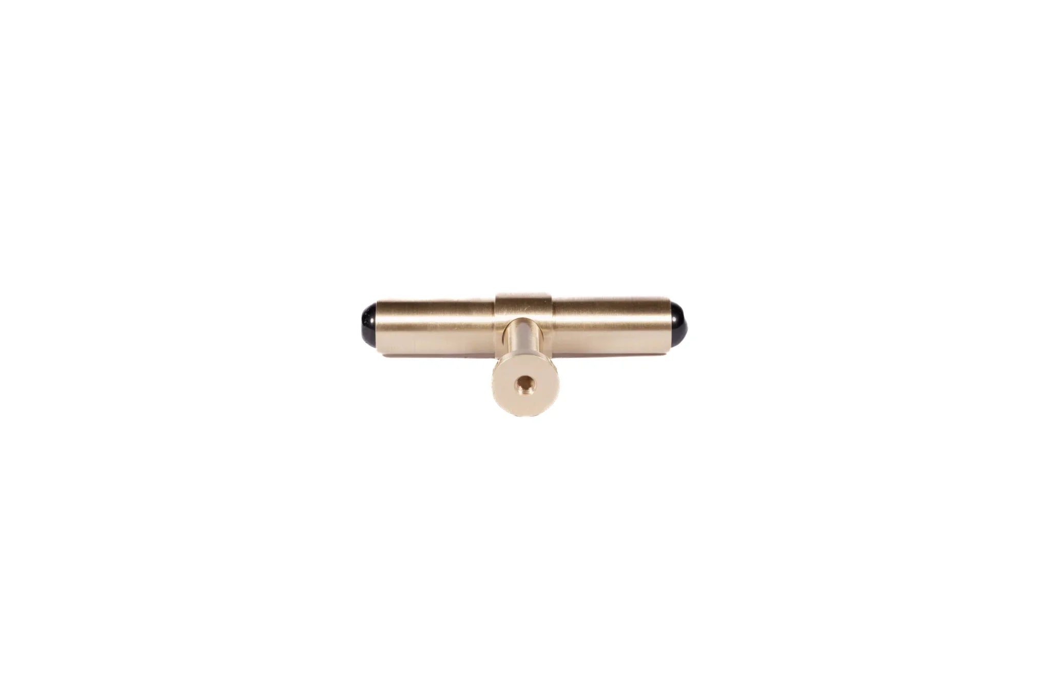 The Zania Handle by Mantara B-0111 is a modern brushed brass handle in gold, ideal for kitchens, dressers, and cabinets.