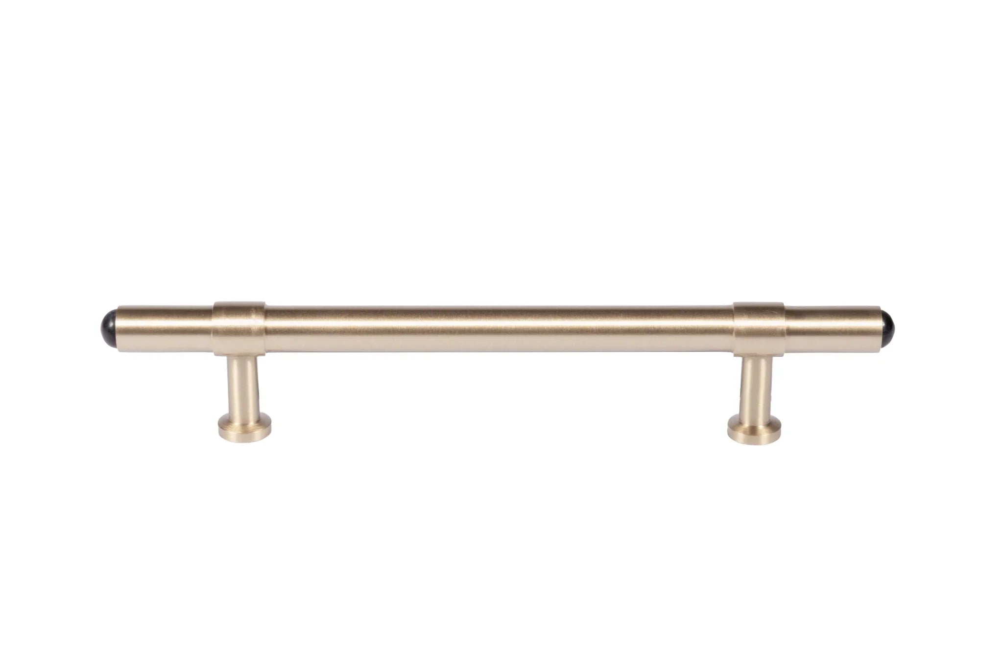 The Zania Handle by Mantara B-0111 is a modern brushed brass handle in gold, ideal for kitchens, dressers, and cabinets.