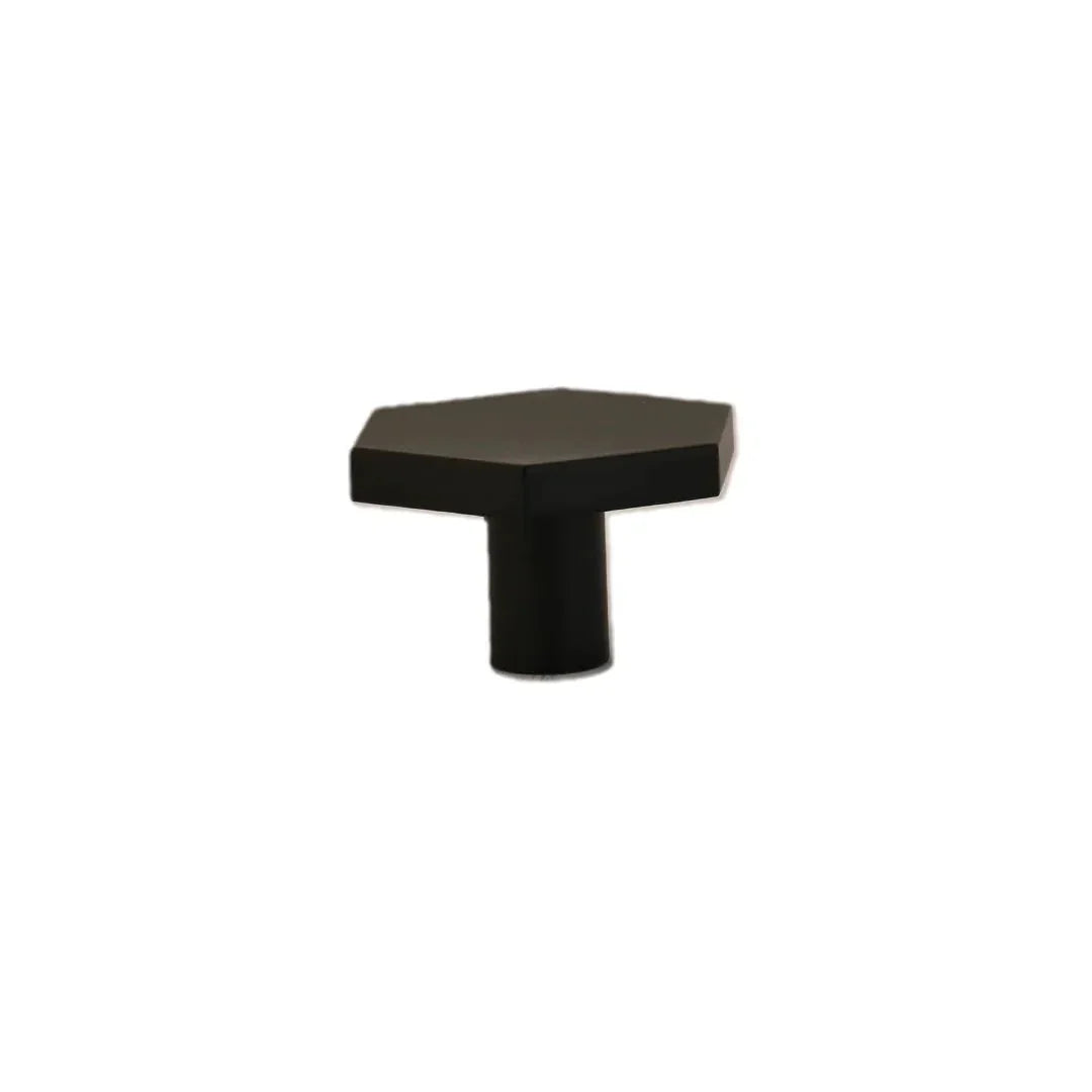 The Mantara B-0131 Zaraya Knob is a modern brass knob in gold, black, and bronze, perfect for drawers, cabinets, and wardrobes.