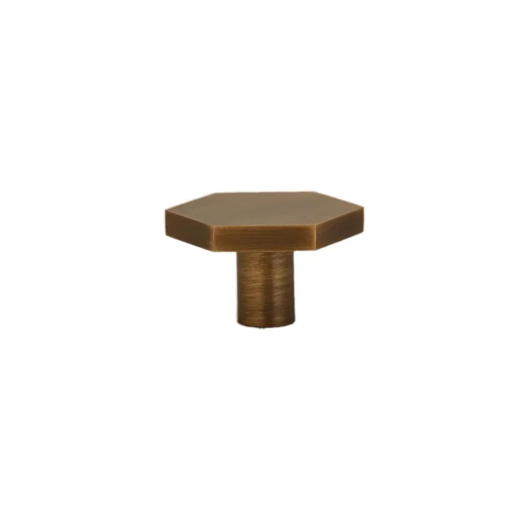The Mantara B-0131 Zaraya Knob is a modern brass knob in gold, black, and bronze, perfect for drawers, cabinets, and wardrobes.