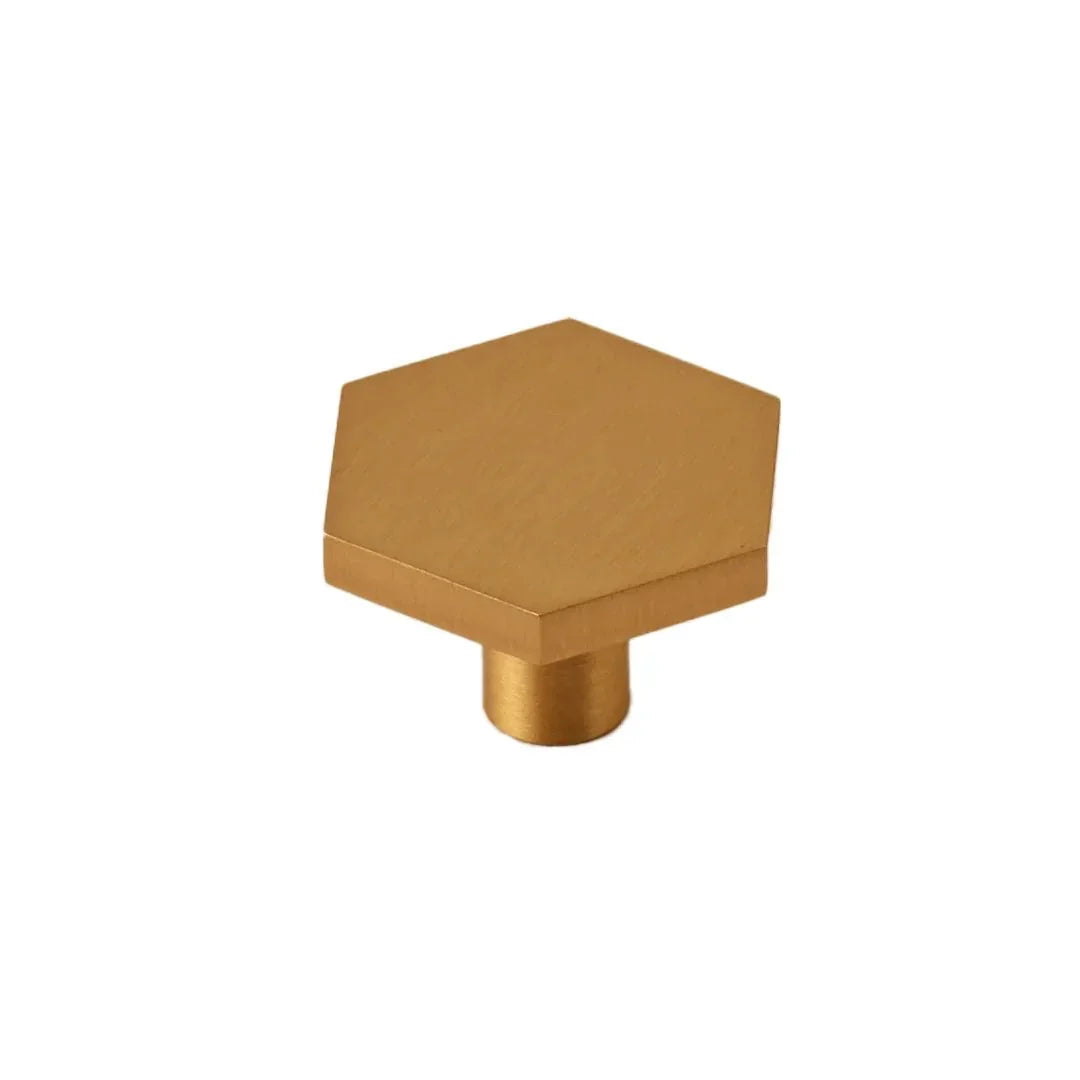 The Mantara B-0131 Zaraya Knob is a modern brass knob in gold, black, and bronze, perfect for drawers, cabinets, and wardrobes.
