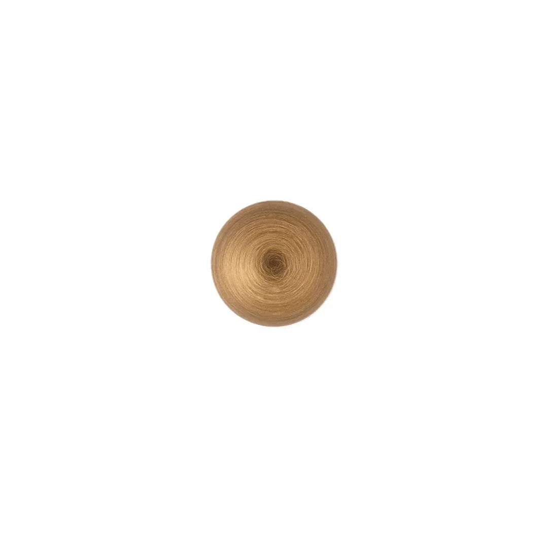 The Mantara B-0001 Zenith Knob is a modern brass knob in brushed bronze, perfect for wardrobes, cabinets, and drawers.