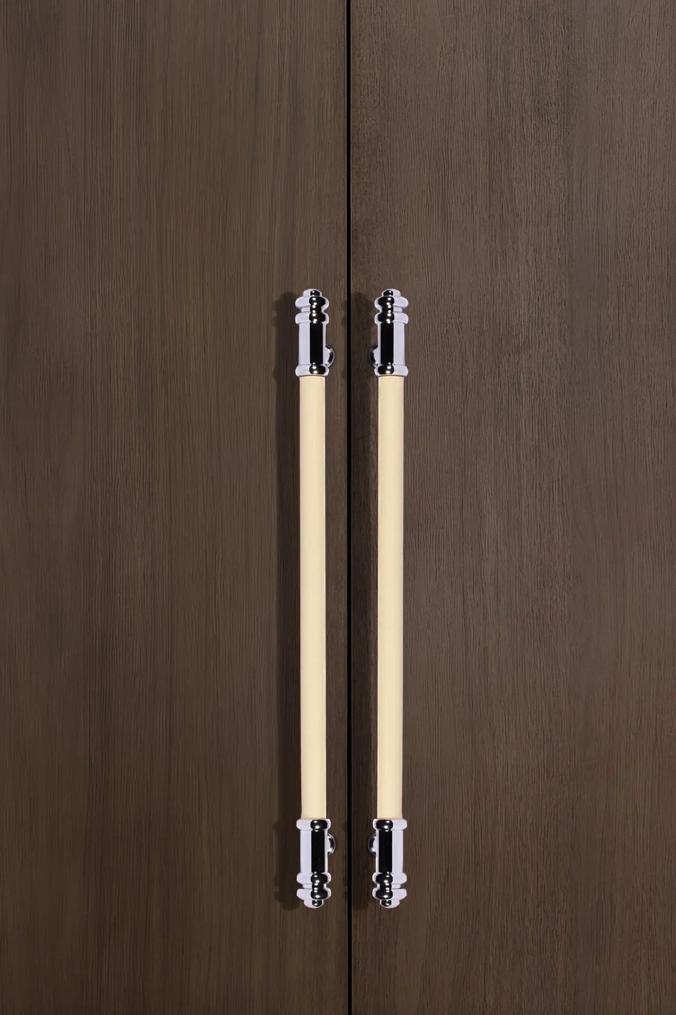 The Mantara L-0013 is a modern brass + leather handle in yellow, ideal for kitchen drawers, dressers, and cabinets.