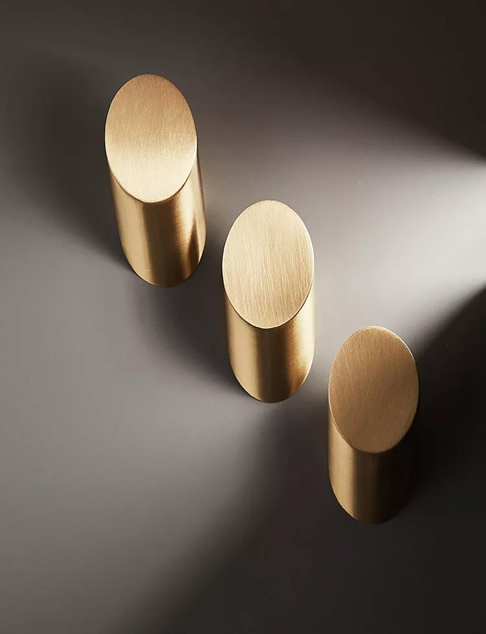 Mantara Hexa Hook B-0091 is a modern brushed brass wall hook in gold, perfect for bathrooms, bedrooms, and living areas.
