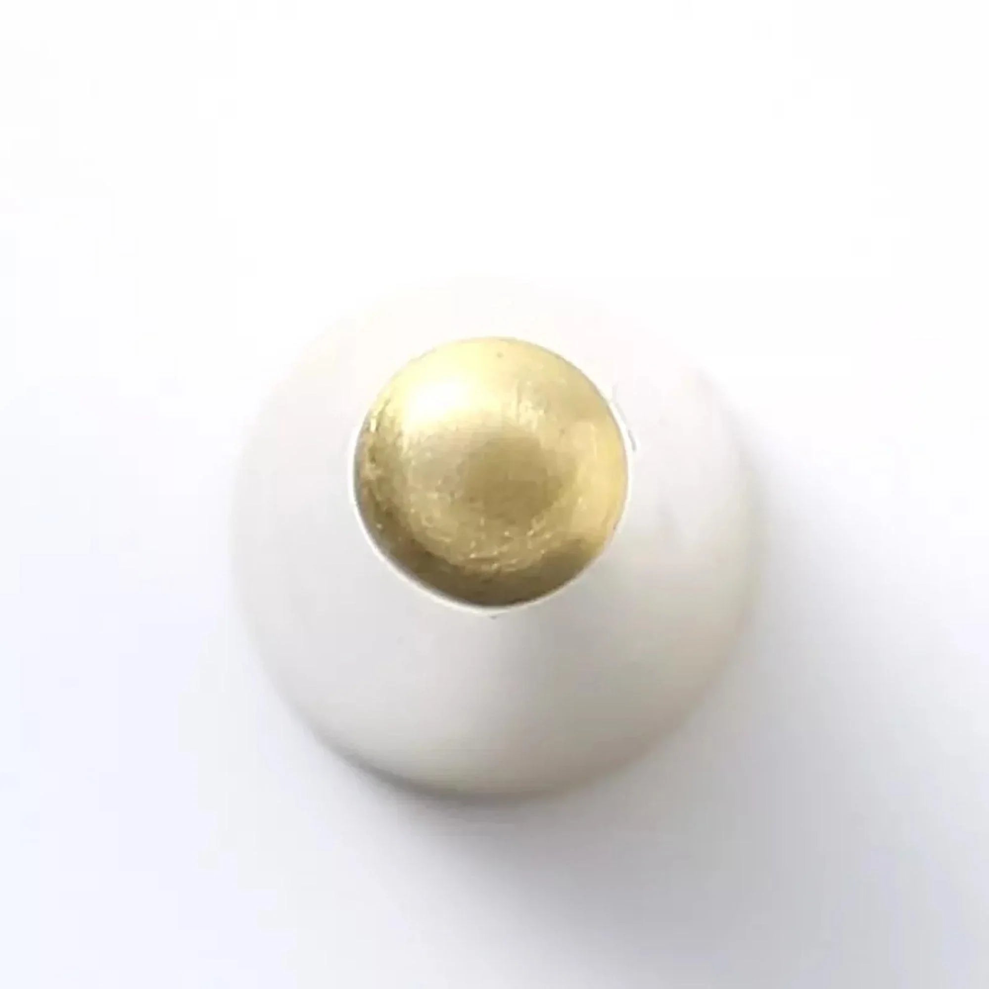 Mantara Mateo Hook B-0095 is a modern brushed brass wall hook in gold, ideal for bathrooms, bedrooms, hotels, and living rooms.