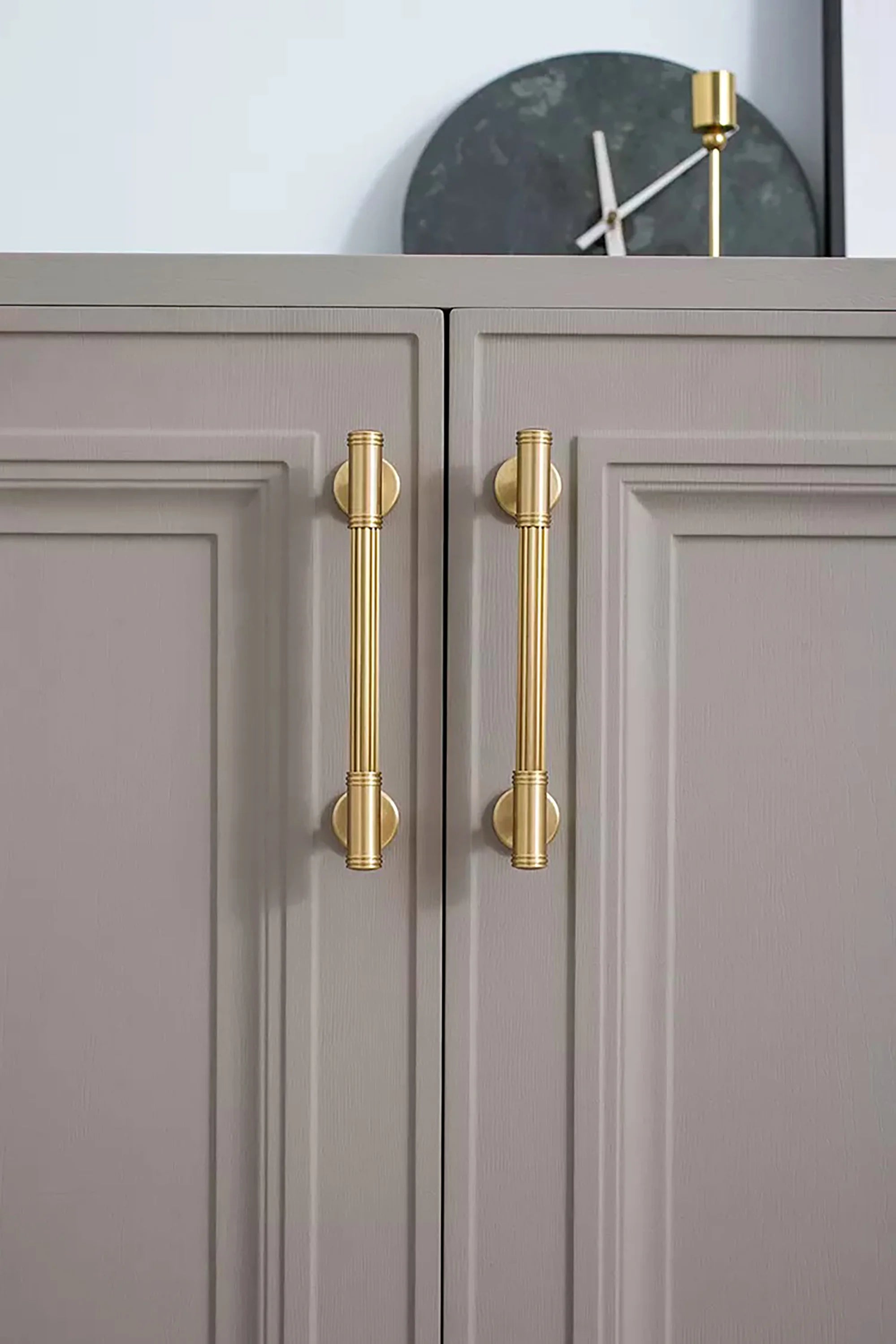 Mantara Olympus Handle B-0098 is a modern solid brass handle in brushed gold, perfect for wardrobes, kitchens, and cabinets.