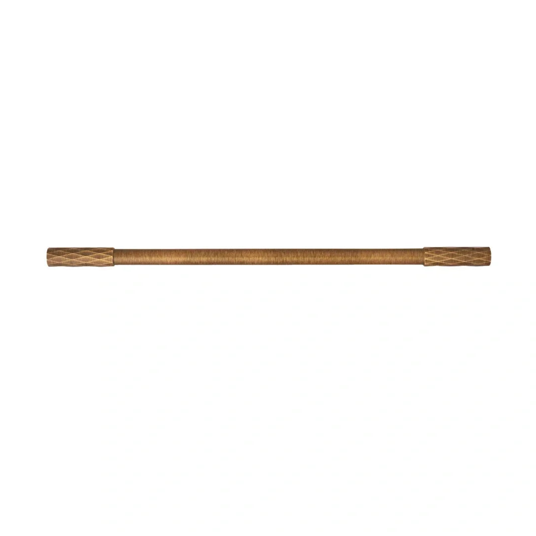 The Mantara B-0130 Ferra Handle is a modern brass handle in bronze finish, perfect for kitchen drawers, cabinets, and furniture.