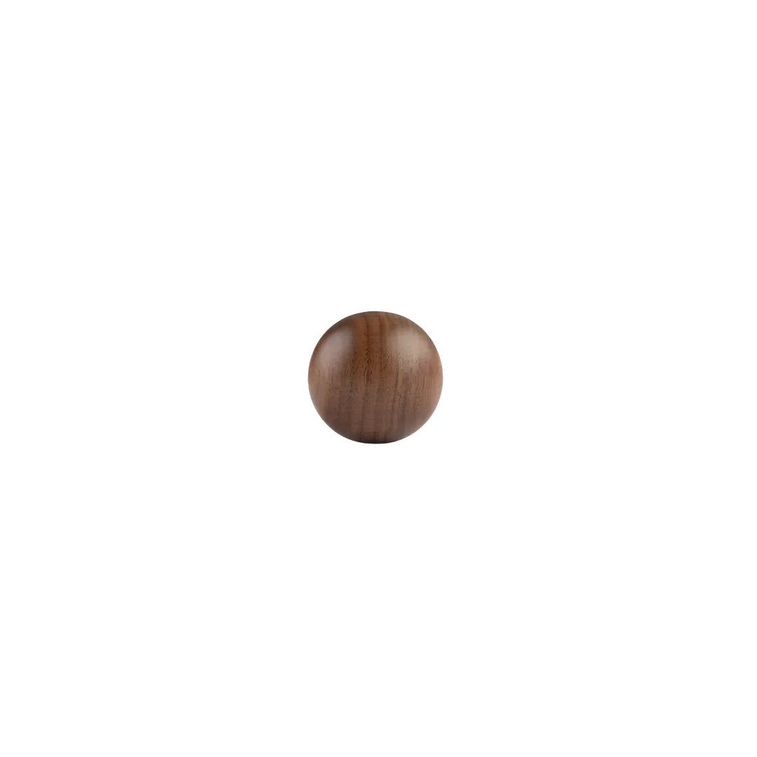 Round Wooden Knob placed on a white background