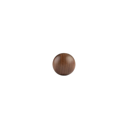 Round Wooden Knob placed on a white background