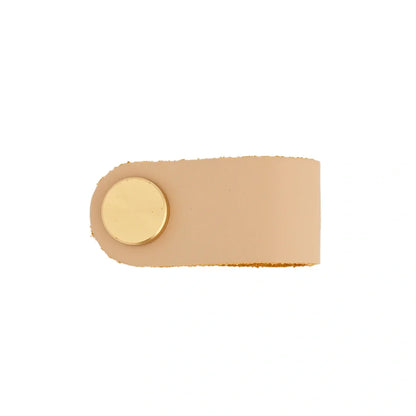 The Mantara L-0001 Maverick Pull Knob is a Nordic leather and brass knob in cream ideal for kitchens and furniture.