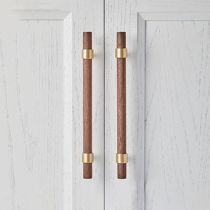 Mantara Holt Handle W-0010 is a modern walnut wood &amp; brass handle in dark brown with brushed finish, ideal for wardrobes &amp; drawers.