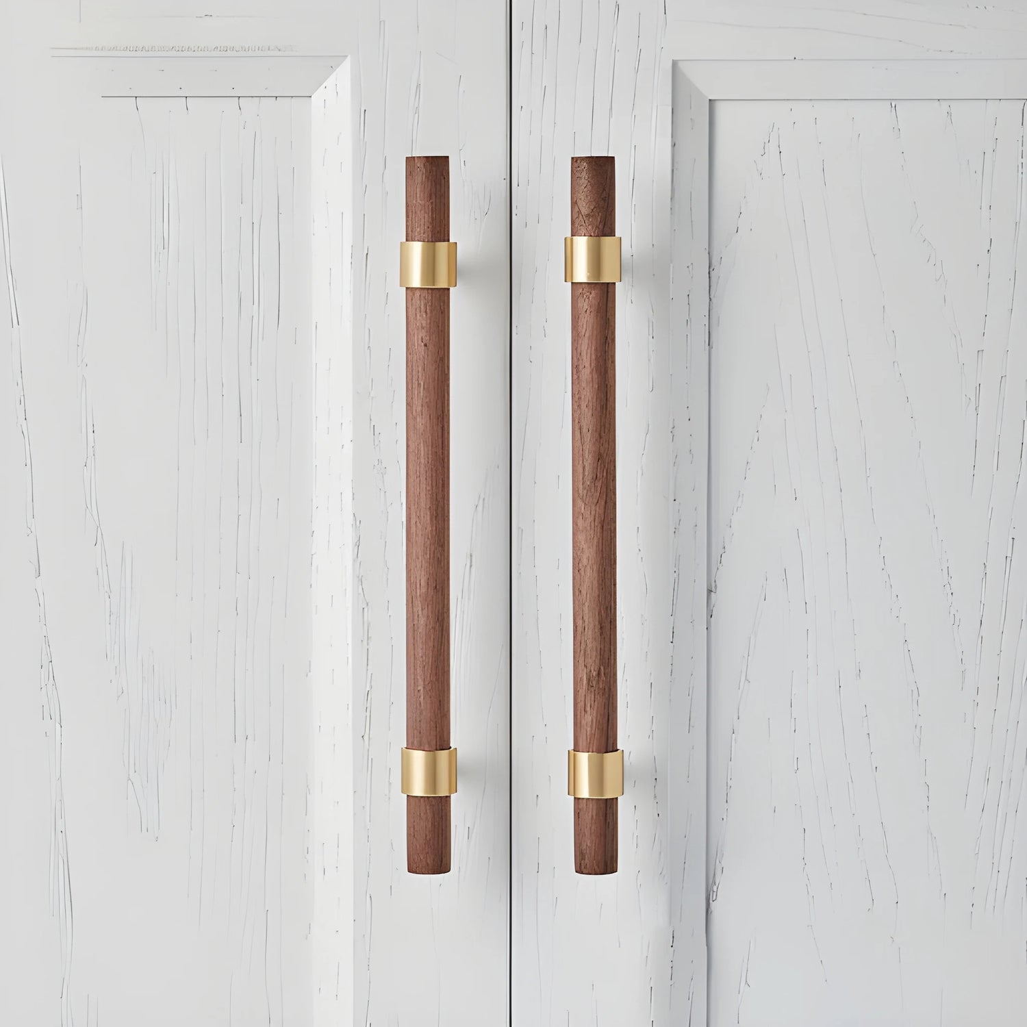 Mantara Holt Handle W-0010 is a modern walnut wood &amp; brass handle in dark brown with brushed finish, ideal for wardrobes &amp; drawers.