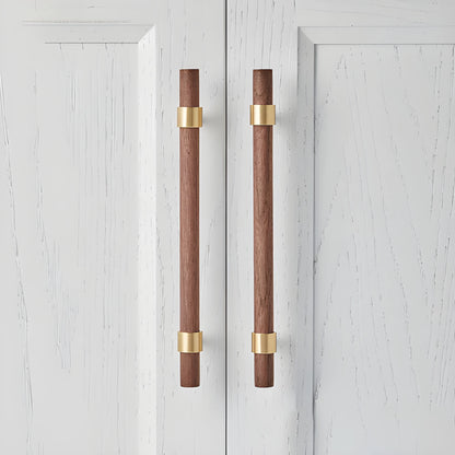 Mantara Holt Handle W-0010 is a modern walnut wood &amp; brass handle in dark brown with brushed finish, ideal for wardrobes &amp; drawers.