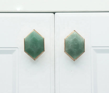 The Mantara C-0004 is a Nordic crystal + brass knob in green, ideal for wardrobes, drawers &amp; cabinets.
