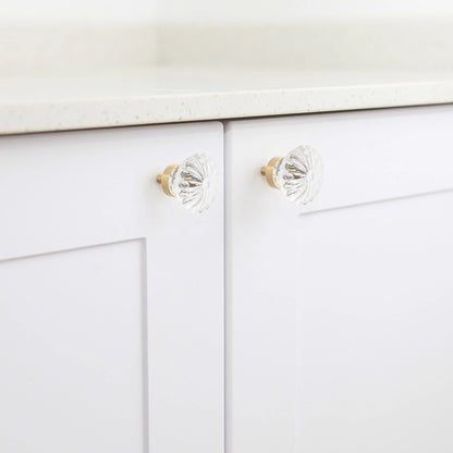 The Mantara C-0010 is a modern crystal knob in white/brass, ideal for kitchens, drawers, and cabinets.