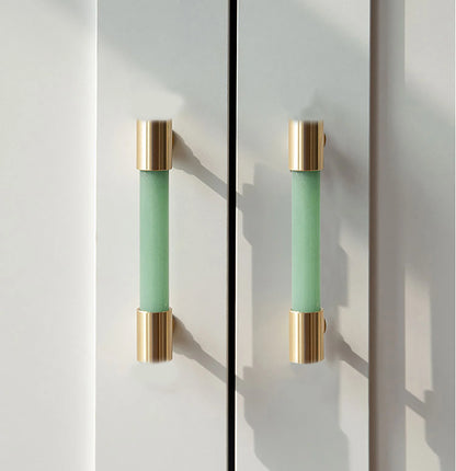 The Mantara C-0014-96 Haze Handle is a modern crystal and brass handle in green, ideal for cabinets and wardrobes.